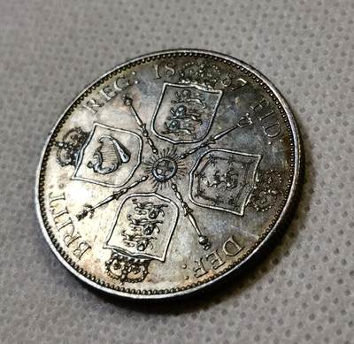 甄臻铺-世界币章拍卖（第44期）精品场拍品征集中，送拍享返佣金等优惠多多 UNC品相英国1887福林银币，原光带彩好状态，现在好品相的裸币不太好找了，细节见图