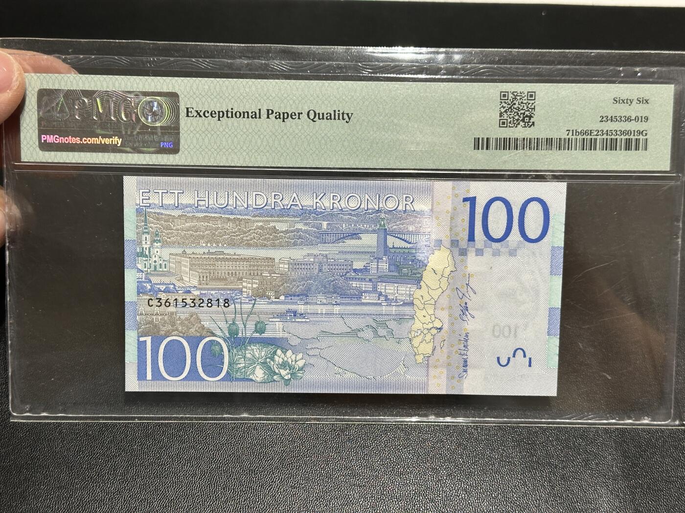 《外钞收藏家》第五百九十五期（优品场）（本平台长期征集拍品、欢迎藏友们联系合作） 2016年瑞典新版100克朗 嘉宝 PMG66 无47尾8