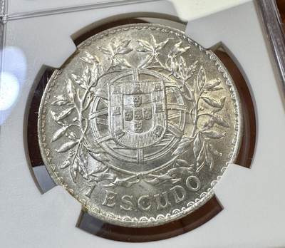 甄臻铺-世界币章拍卖（第44期）精品场拍品征集中，送拍享返佣金等优惠多多 NGC-MS61 葡萄牙 1916年 1埃斯库多银币，古典设计很好看，流水转光疑似低评