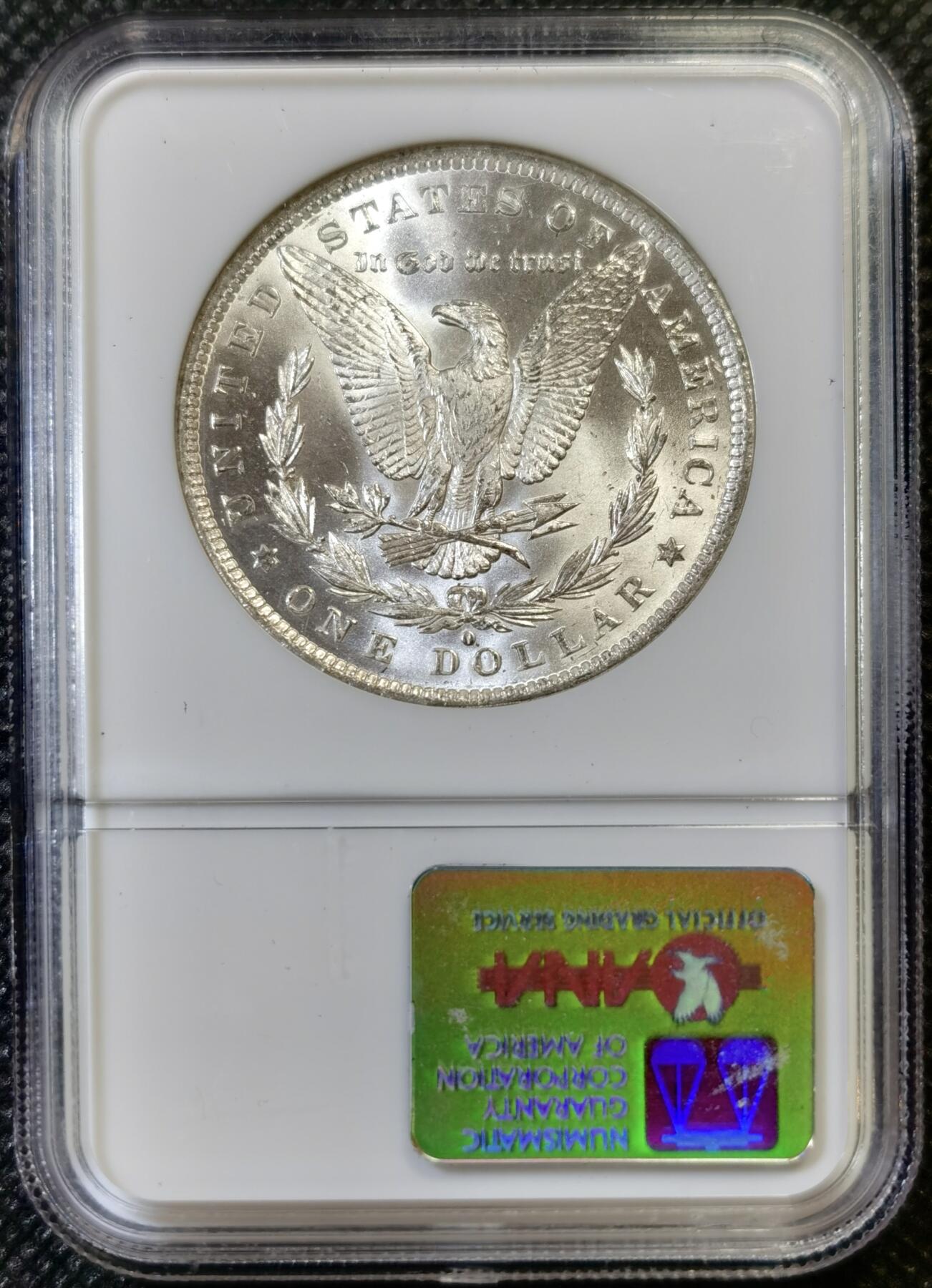 甄臻铺-世界币章拍卖（第44期）精品场拍品征集中，送拍享返佣金等优惠多多 NGC-MS64 1884年O版美国摩根，币面干净整洁，小白盒手感好