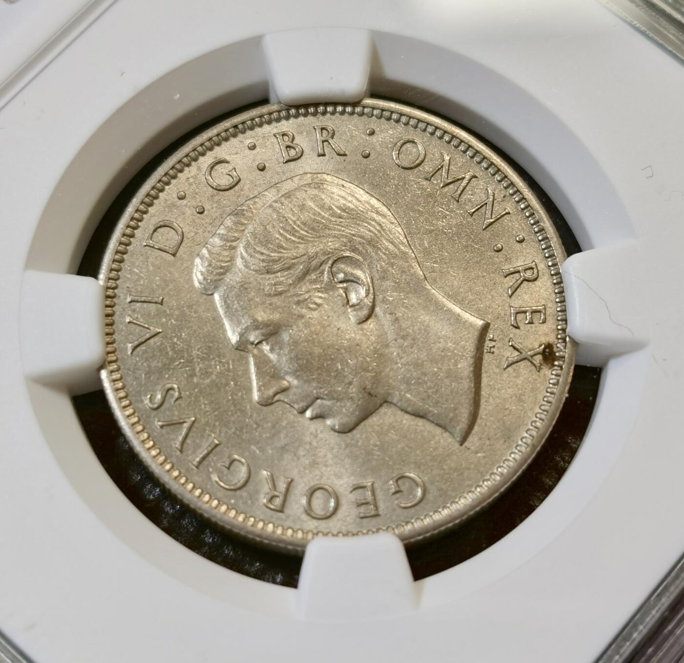 甄臻铺-世界币章拍卖（第44期）精品场拍品征集中，送拍享返佣金等优惠多多 NGC-MS63 英国1949乔治六世弗洛林硬币，状态很不错的一枚，适合凑品种