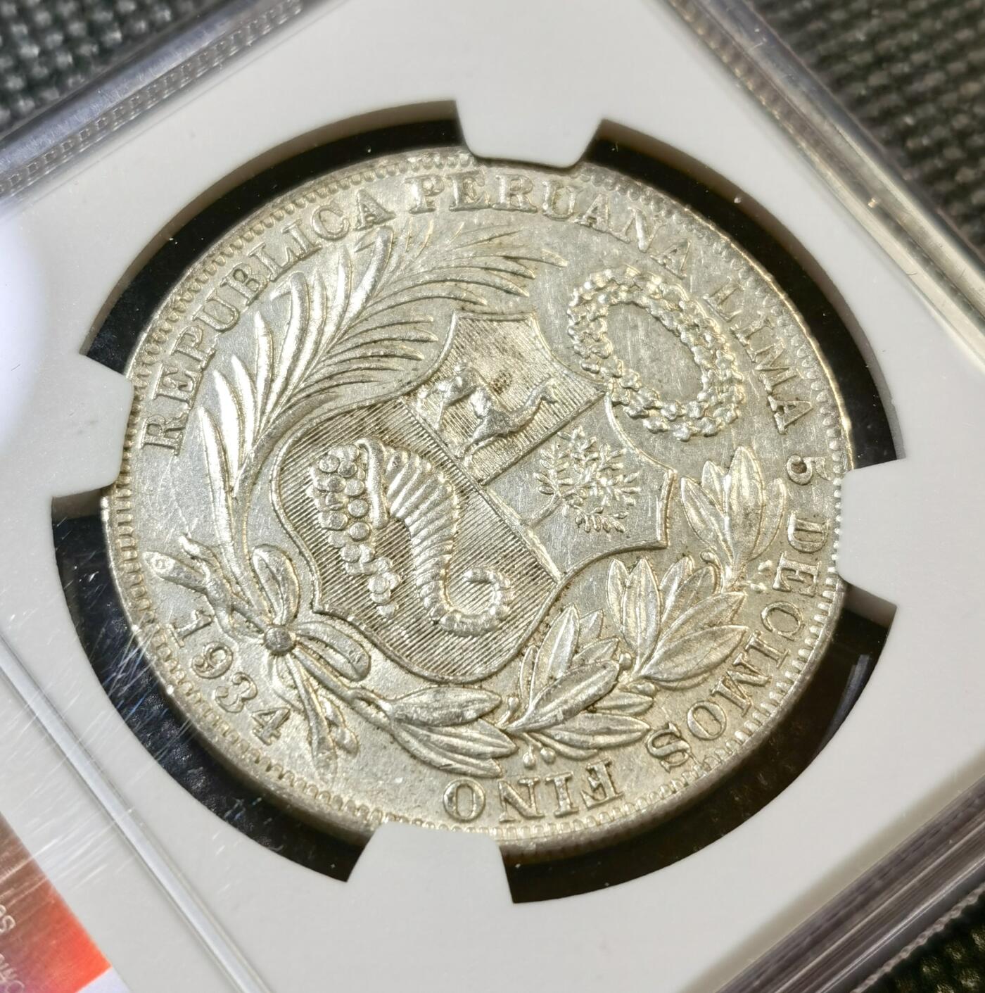 甄臻铺-世界币章拍卖（第44期）精品场拍品征集中，送拍享返佣金等优惠多多 NGC-AU55 1934年秘鲁索尔银币