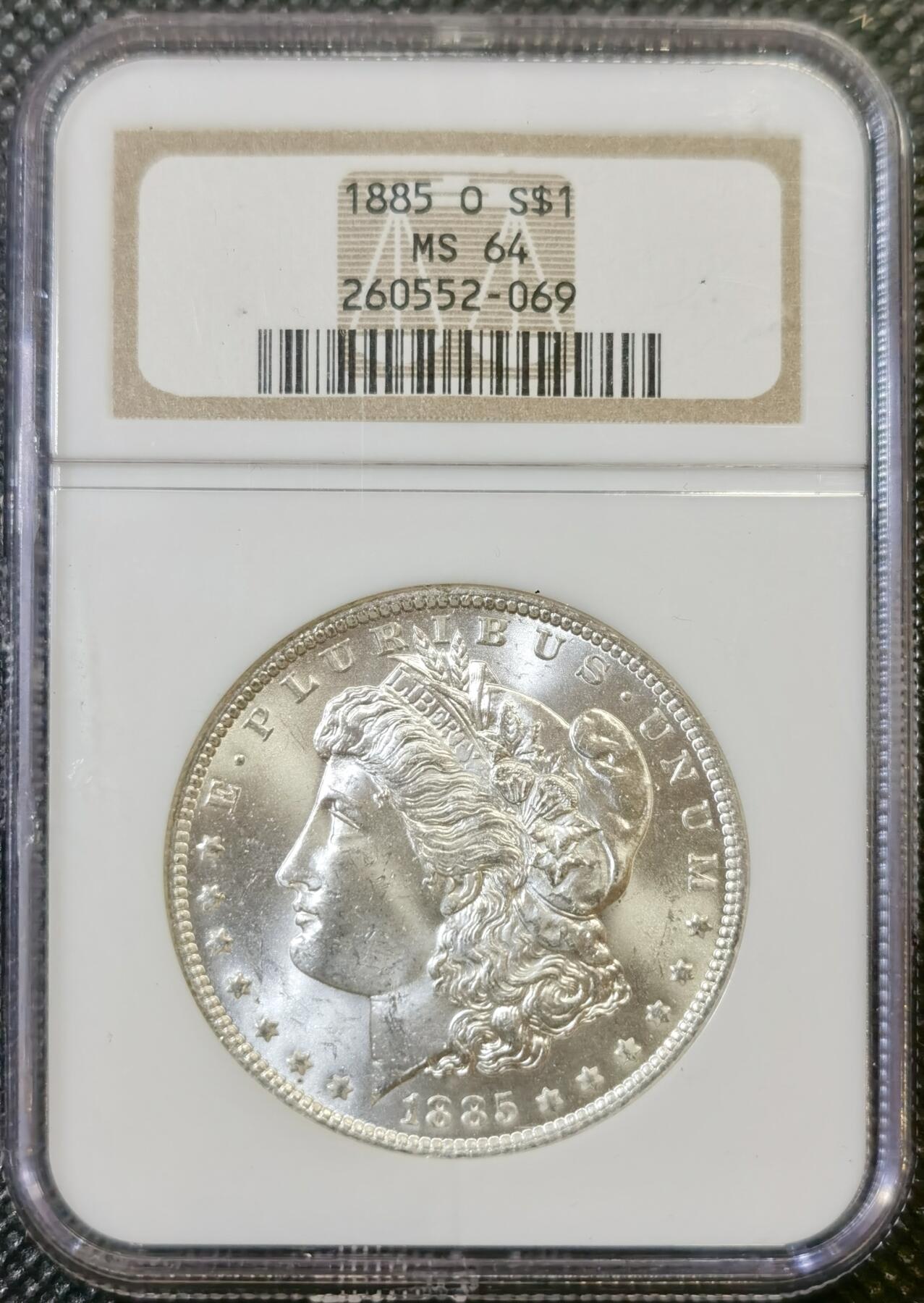 甄臻铺-世界币章拍卖（第44期）精品场拍品征集中，送拍享返佣金等优惠多多 NGC-MS64 1885年O版美国摩根，小白盒手感好，早期严评