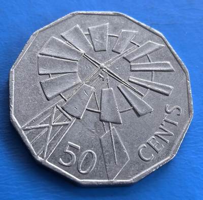 外国优质老铜币高银银币，周六九点倒数截拍，满百包邮，持续收拍 - 澳大利亚2002年内陆年大风车纪念币，以风车为主题，独特造型展现澳洲特色风物，八边形形制经典，是记录澳本土元素、兼具实用与收藏价值的钱币，见证其文化与货币设计融合 。