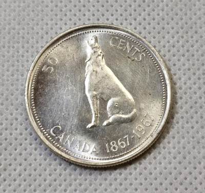 甄臻铺-世界币章拍卖（第44期）精品场拍品征集中，送拍享返佣金等优惠多多 - 加拿大独立百年狼50分   1967年  转光柔顺，未流通品相  30mm   11.6g ，细节见图