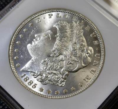 甄臻铺-世界币章拍卖（第44期）精品场拍品征集中，送拍享返佣金等优惠多多 NGC-MS64 1885年美国摩根大银币，人像干净，地板整洁，小白盒