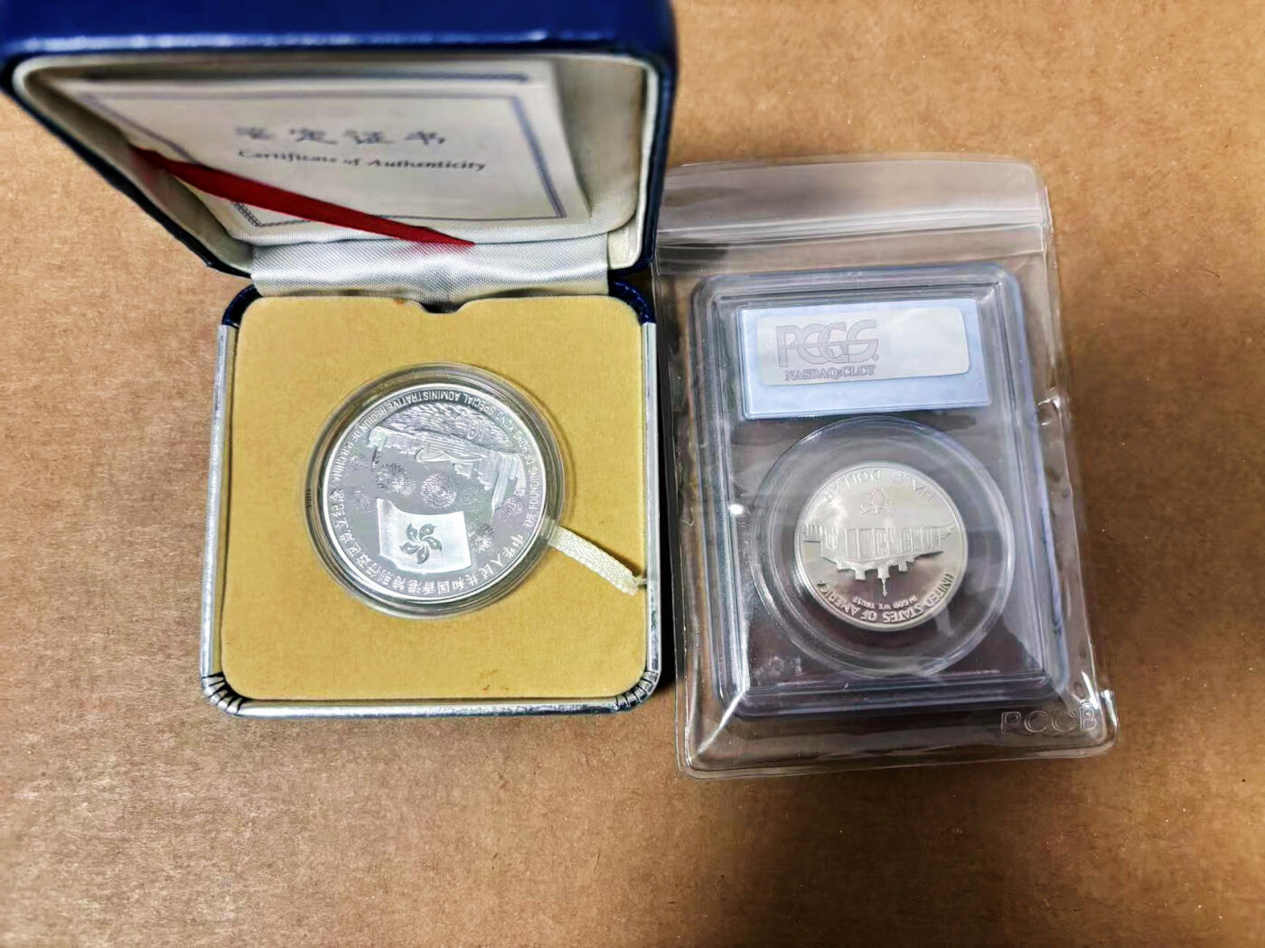 【Blue Auction】世界纸币精拍第764期——18级TOP拍卖/信誉/品质/专业/高效💫 【一组2枚】美国 1982-S 50美分 PCGS PR69DCAM&香港 1997年回归纪念银币 带证书 品相如图