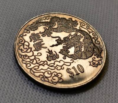 甄臻铺-世界币章拍卖（第44期）精品场拍品征集中，送拍享返佣金等优惠多多 新加坡2000年龙年龙生肖10元纪念币，细节见图