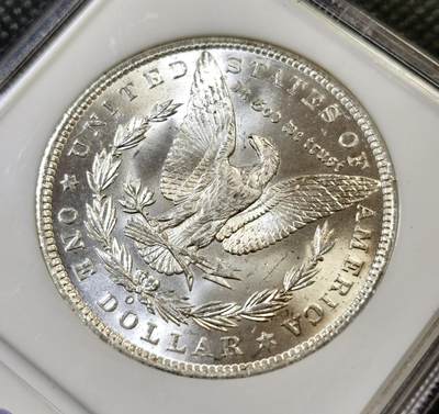 甄臻铺-世界币章拍卖（第44期）精品场拍品征集中，送拍享返佣金等优惠多多 NGC-MS64 1885年O版美国摩根，小白盒手感好，早期严评