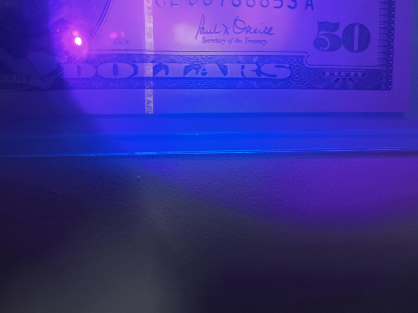 2001年（稀有年份）大头50，全新有一次轻微潮斑（非黄斑），豹子身8，需要直接购买可禾厶