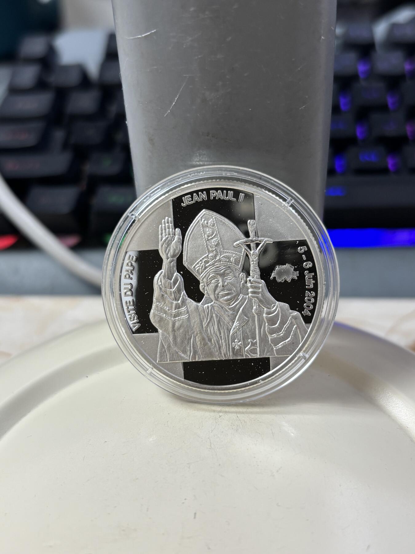 第185期拍卖 刚果2004年教皇访问瑞士纪念银币，925银，25克，银价346元