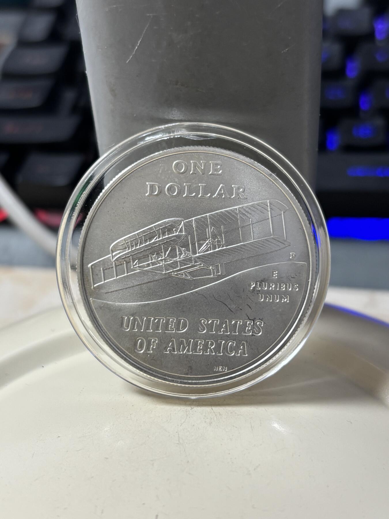 第185期拍卖 美国2003年人类首飞莱特兄弟磨砂版银币，900银，26.72克，银价360