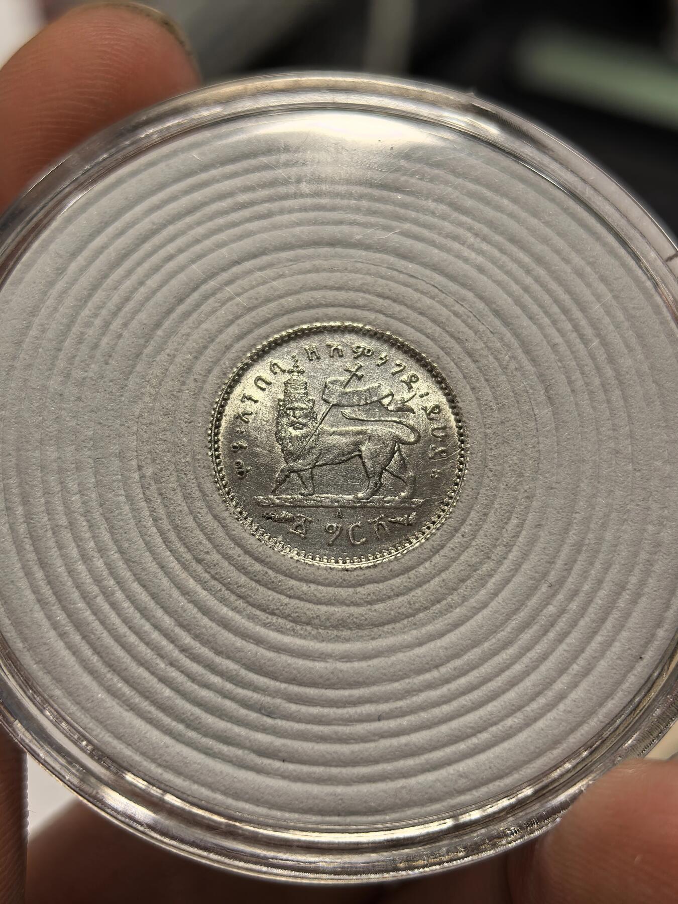 博洋堂世界钱币拍卖第153期（全场包邮） 埃塞俄比亚1903年1Gersh，835银，原卷原拆，转光极强，深打细节完整，人像炯炯有神，狮子全脸，底板模具抛光线和机铸纹清晰可见，埃塞币普遍弱打，这枚打制完美，非常难得，送评可搏高分