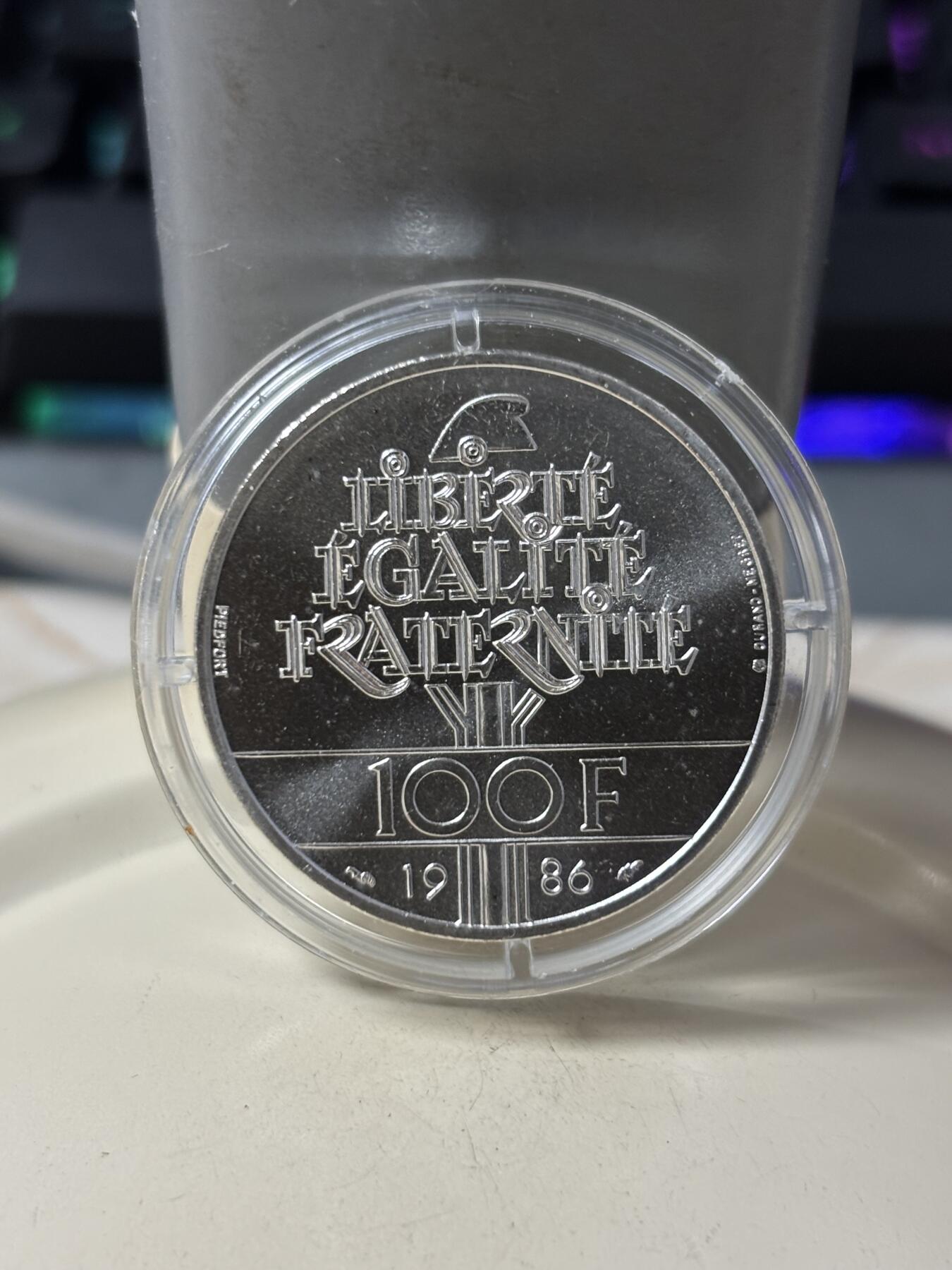 第185期拍卖 法国1986年自由女神加厚30克磨砂版本纪念银币，900银，银价404元