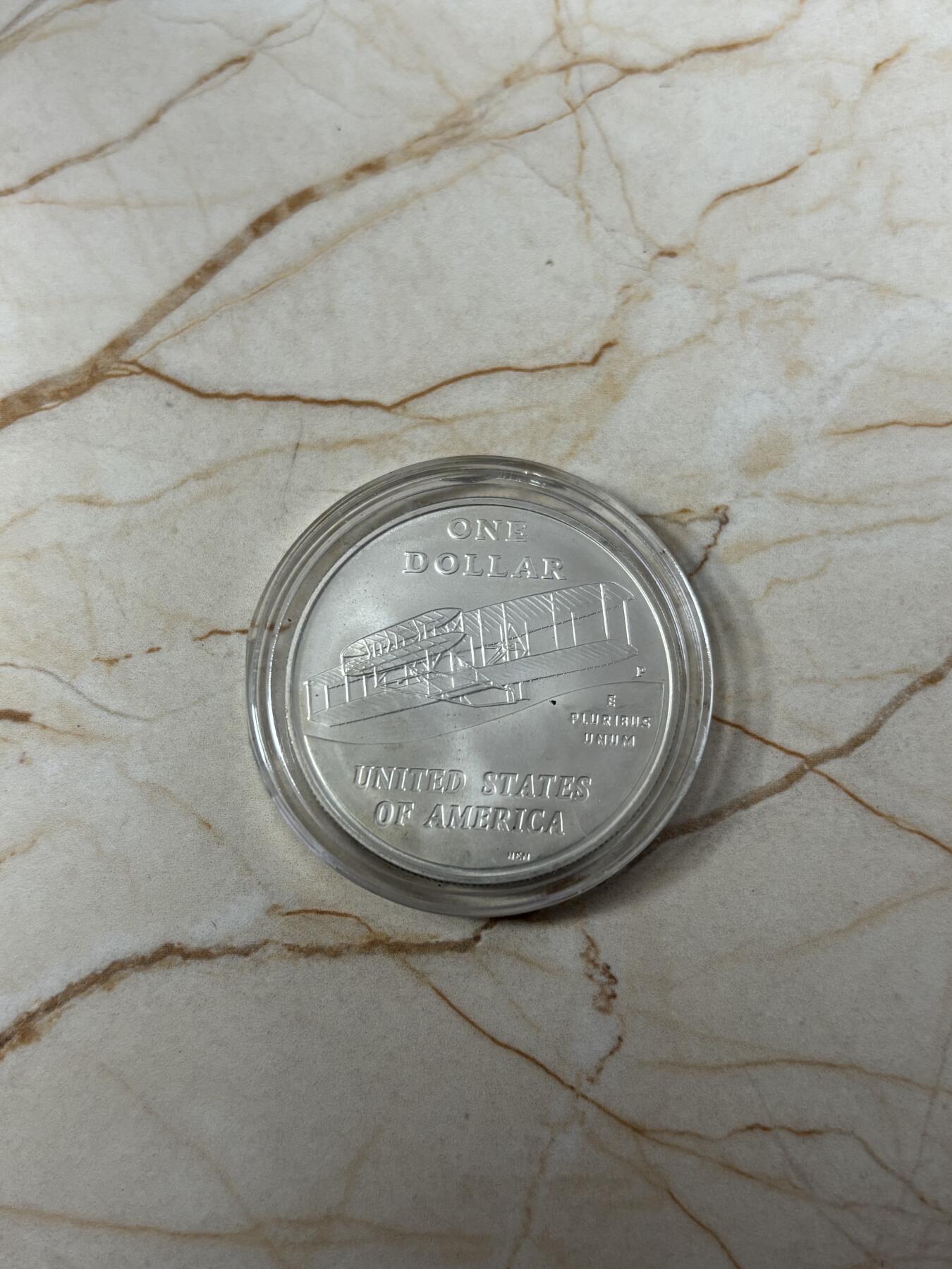 第185期拍卖 美国2003年人类首飞莱特兄弟磨砂版银币，900银，26.72克，银价360