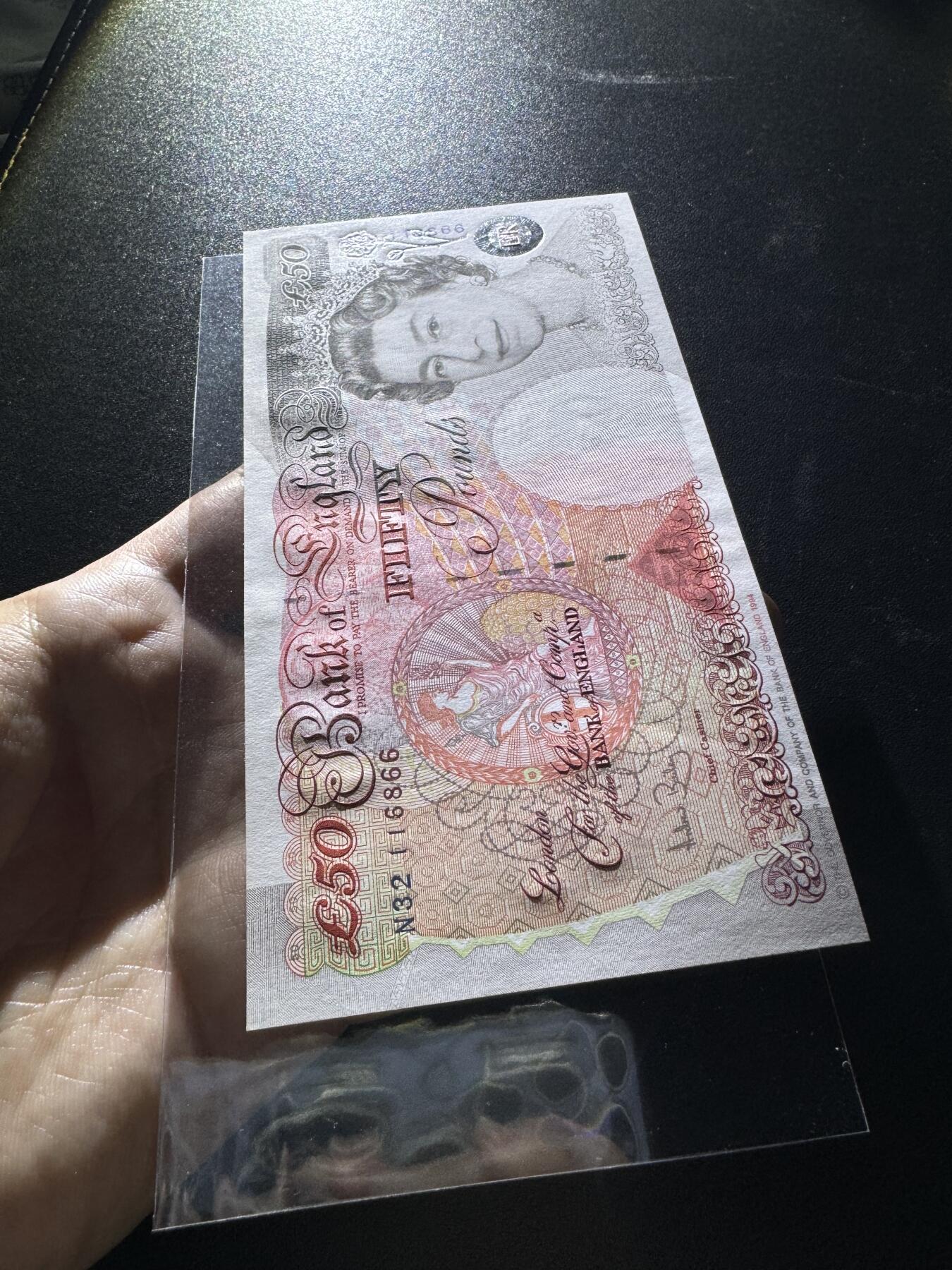 【外币出坑】0元0佣金起拍 无保留价 英国E序列 50磅 倒置号AU-Unc 如图