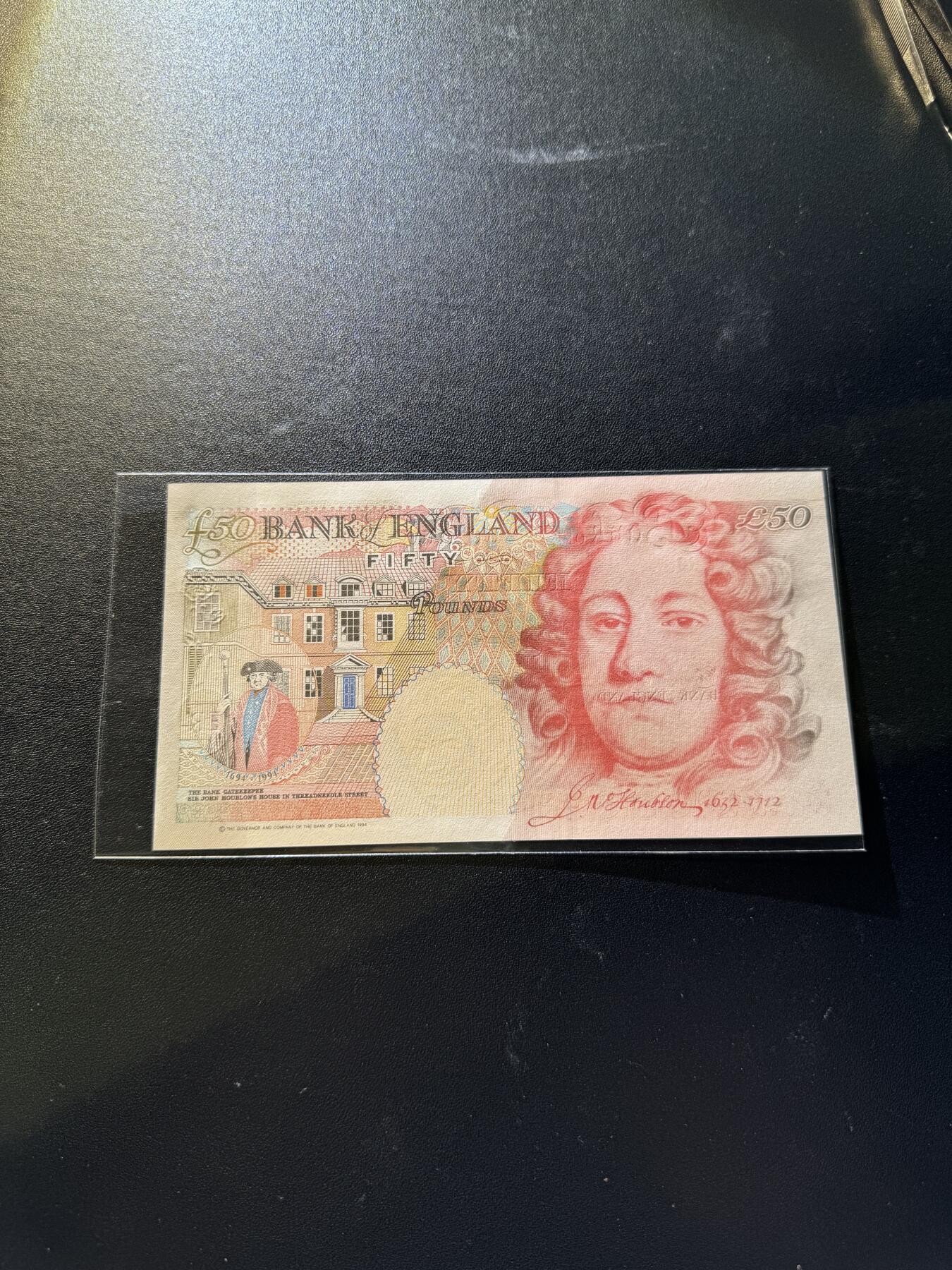 【外币出坑】0元0佣金起拍 无保留价 英国E序列 50磅 倒置号AU-Unc 如图