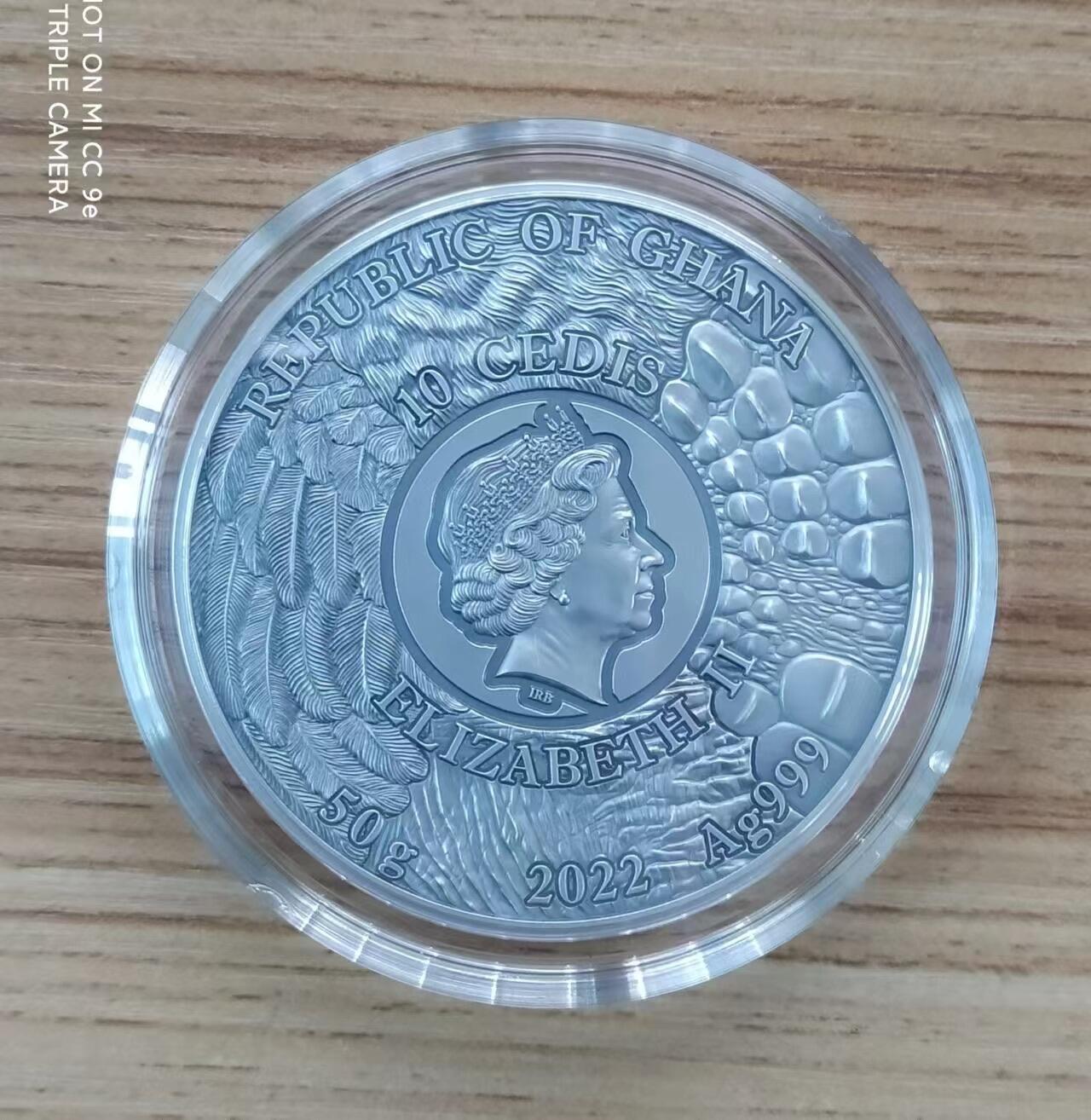 第185期拍卖 【龙头币】加纳2022，狂野杀手(1)-黑豹猎鸟，50克加大(直径达50mm)超高浮雕,仿古镀金银币. 盒证全. 龙头币 (狂野系列第一枚)，该系列即将发行第三枚. 实物图案超漂亮、立体. 新热门，国外售价348美元