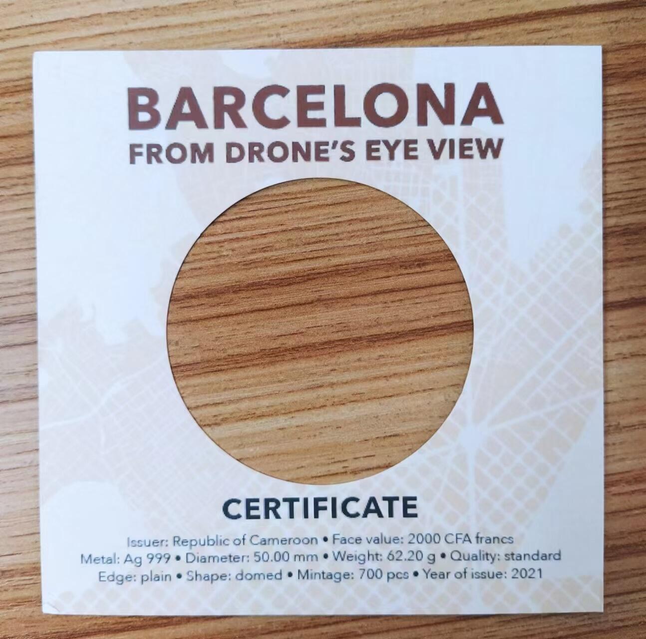 第185期拍卖 【龙头币,2盎司新无人机迷宫系列】喀麦隆2021年，无人机之下-巴萨罗那迷宫，2盎司加大(直径达50mm)、正反高深凹凸曲弧面穹顶形(半球面形),高浮雕仿古银币. 盒证全. 迷宫热门银币. 国外原售价316美元