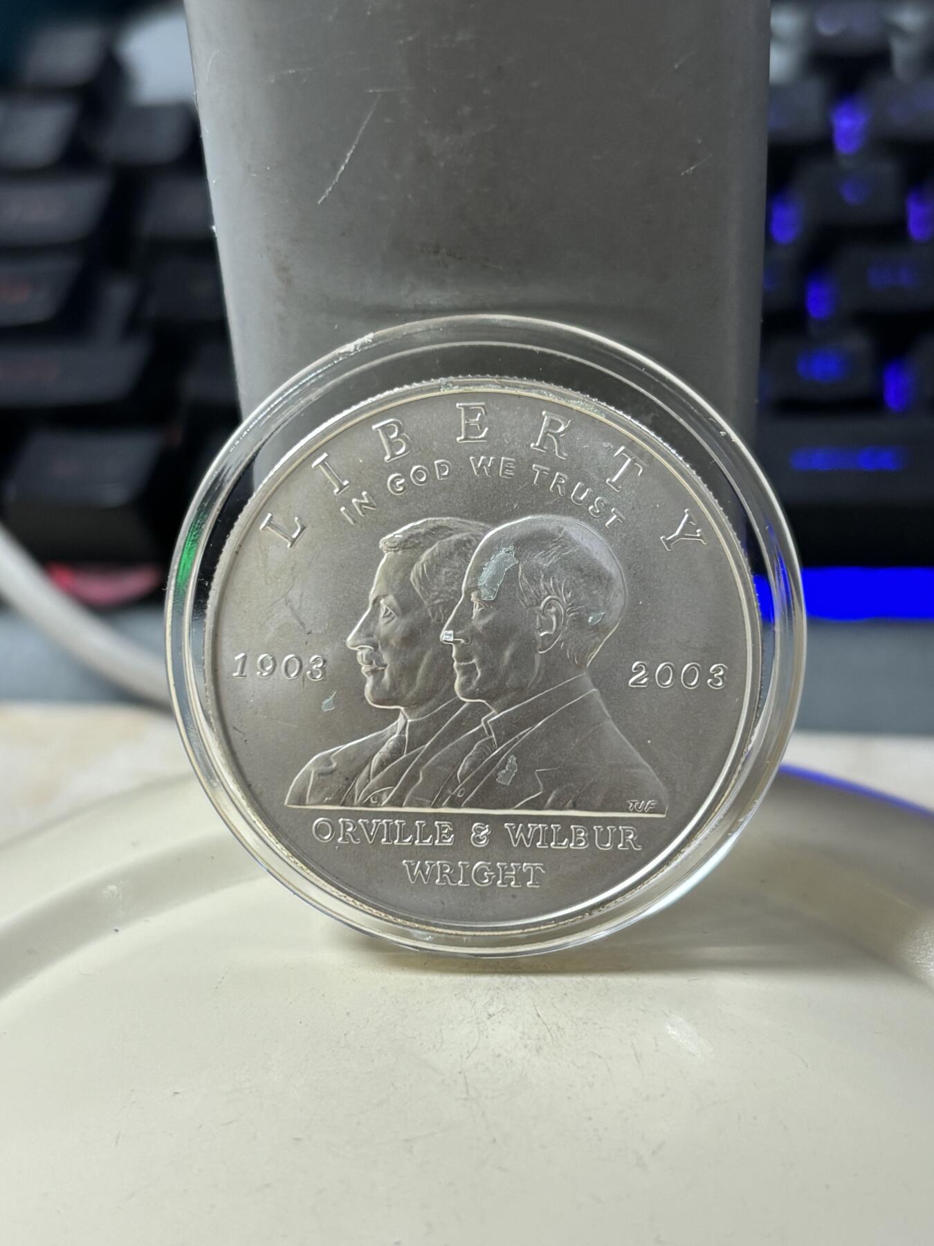 第185期拍卖 美国2003年人类首飞莱特兄弟磨砂版银币，900银，26.72克，银价360