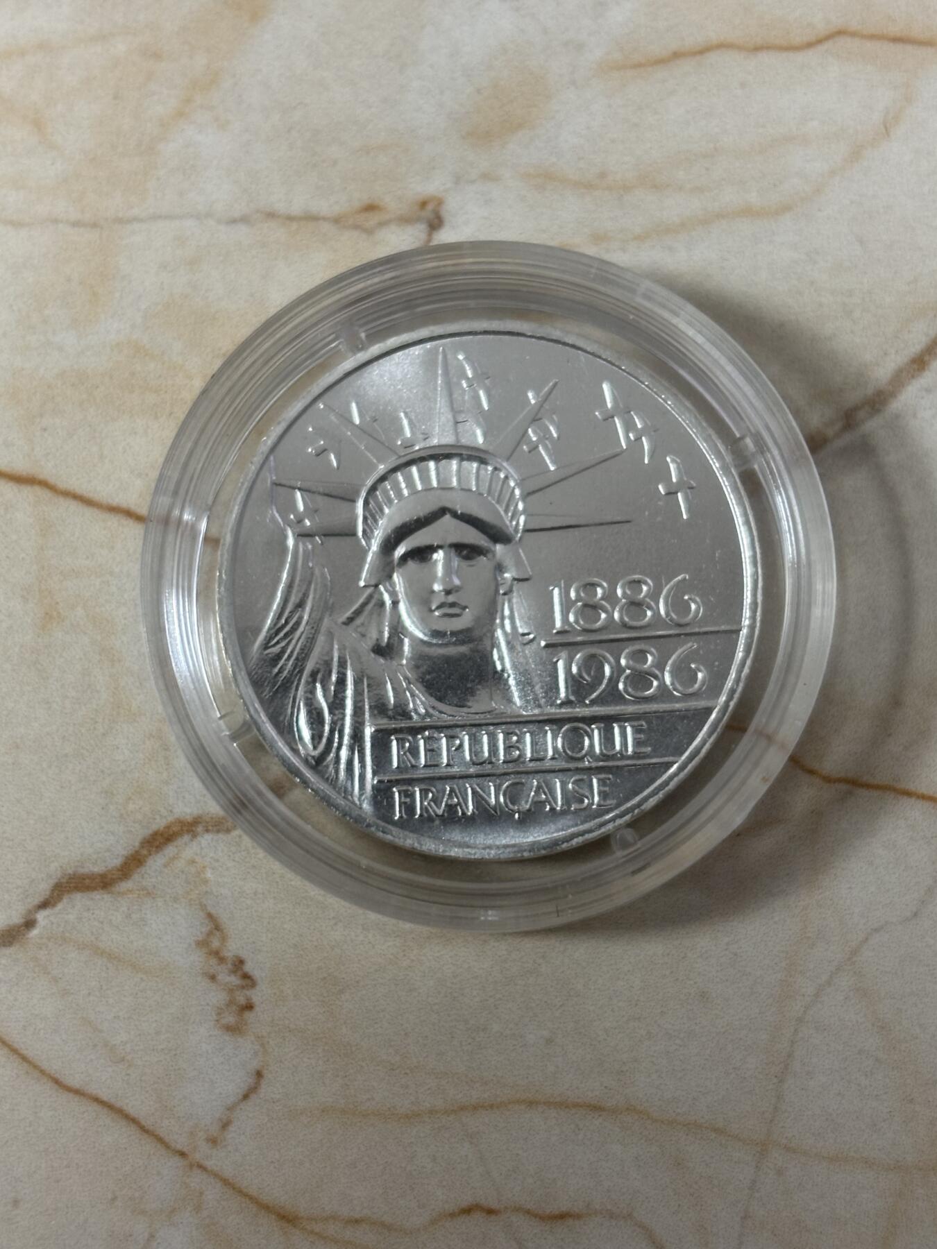 第185期拍卖 法国1986年自由女神加厚30克磨砂版本纪念银币，900银，银价404元