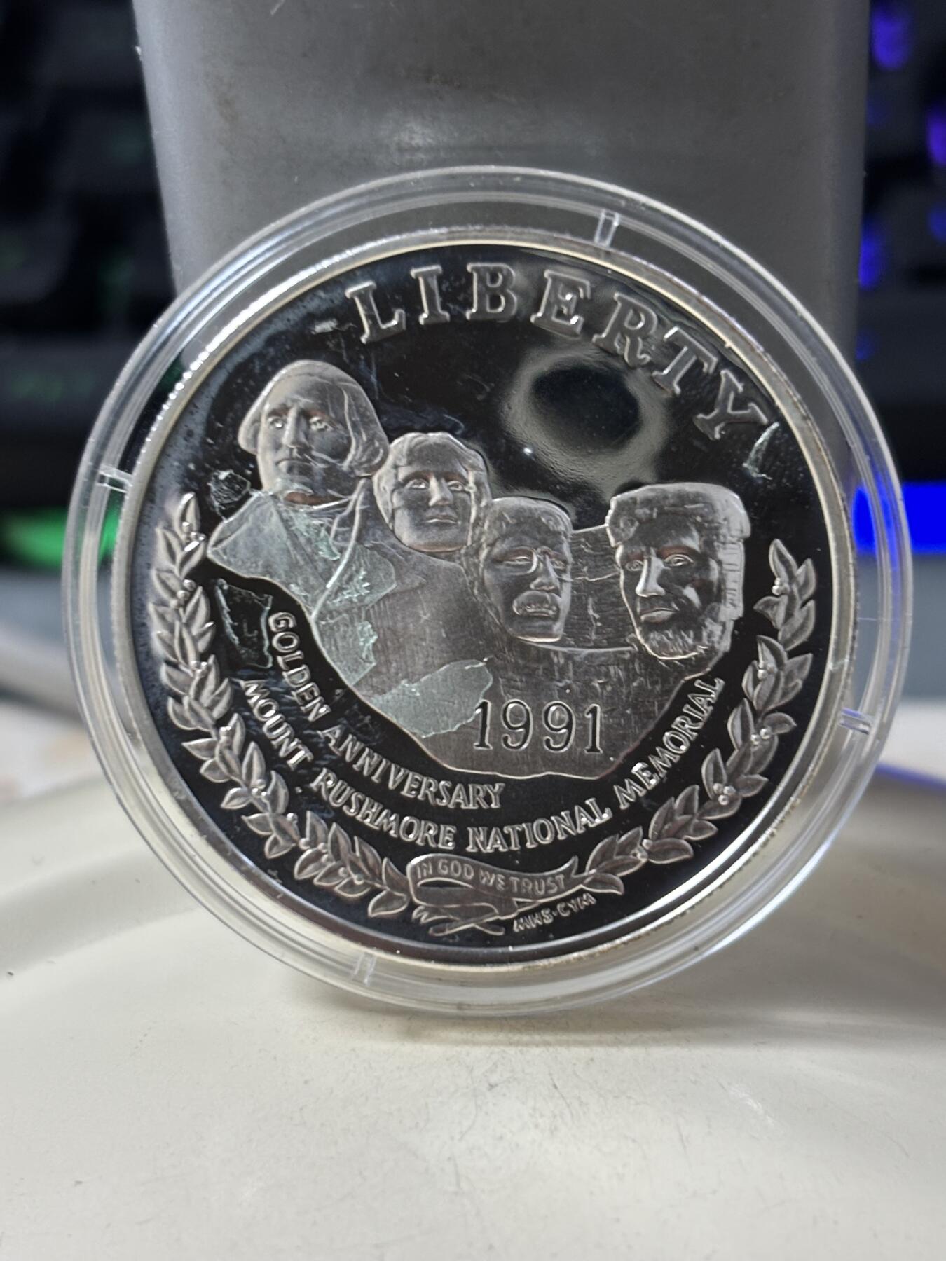 第185期拍卖 美国1991年总统山1美元纪念银币，900银，26.73克，银价360