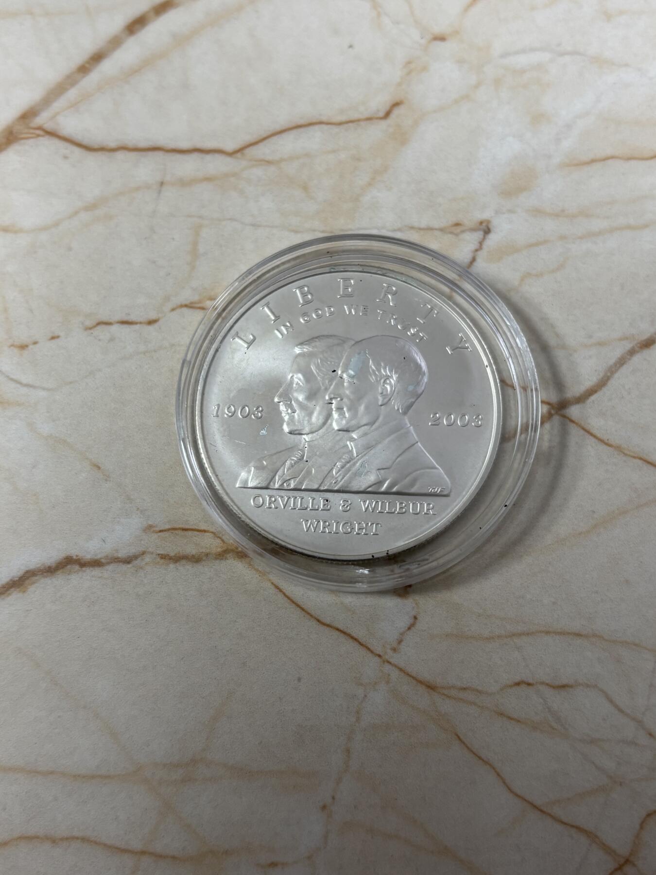 第185期拍卖 美国2003年人类首飞莱特兄弟磨砂版银币，900银，26.72克，银价360