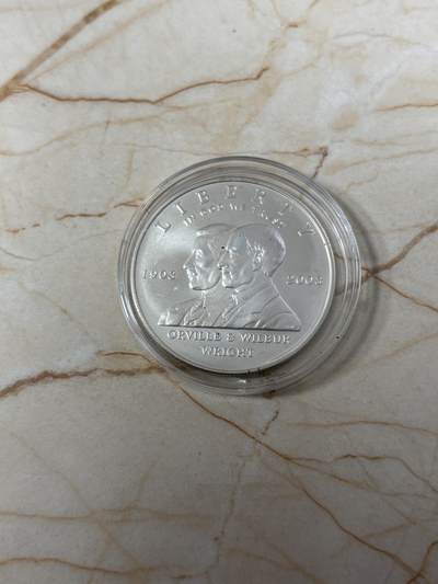 第185期拍卖 - 美国2003年人类首飞莱特兄弟磨砂版银币，900银，26.72克，银价359.5