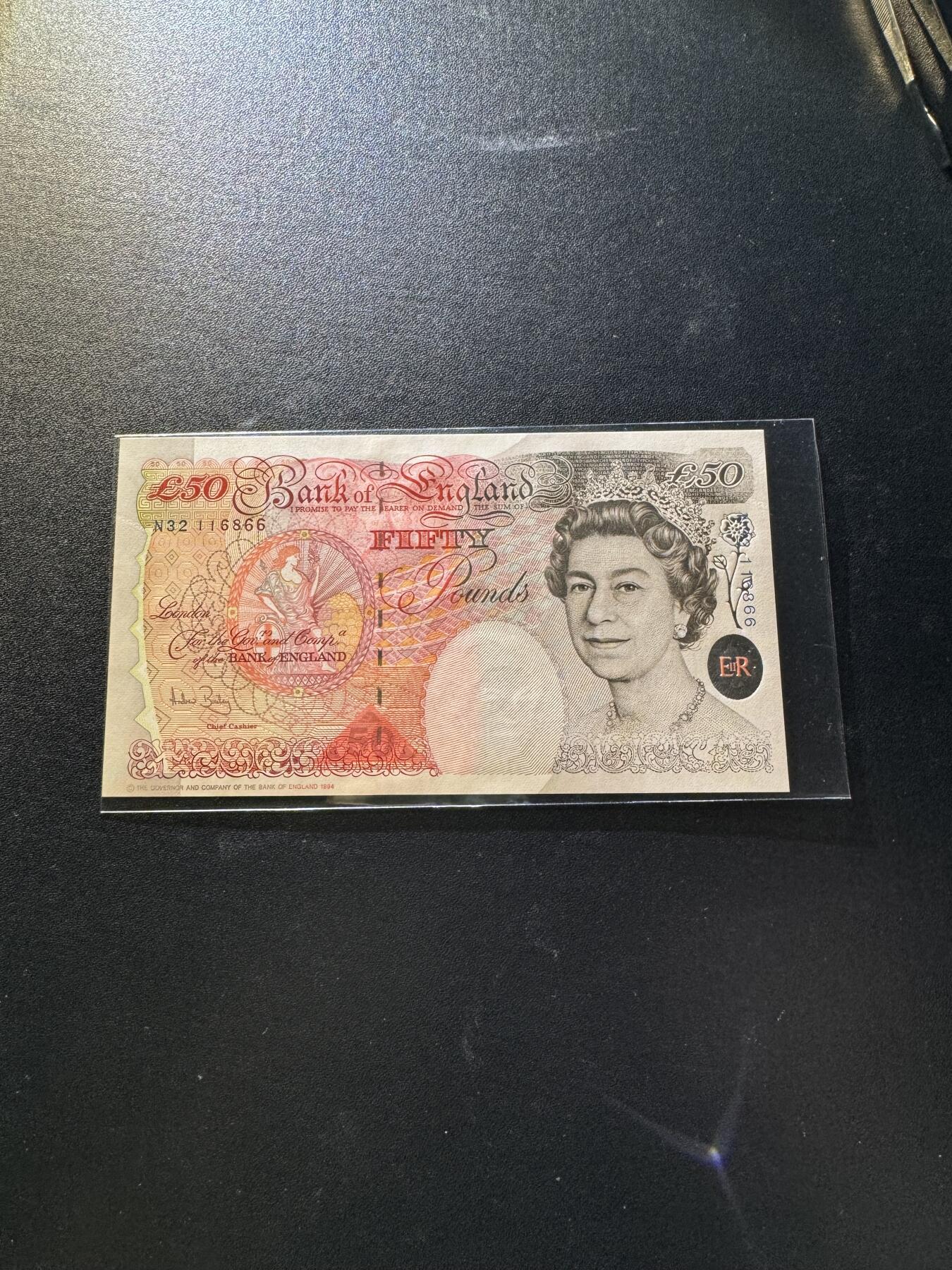 【外币出坑】0元0佣金起拍 无保留价 英国E序列 50磅 倒置号AU-Unc 如图