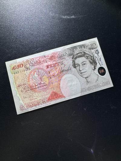 【外币出坑】0元0佣金起拍 无保留价 - 英国E序列 50磅 倒置号AU-Unc 如图
