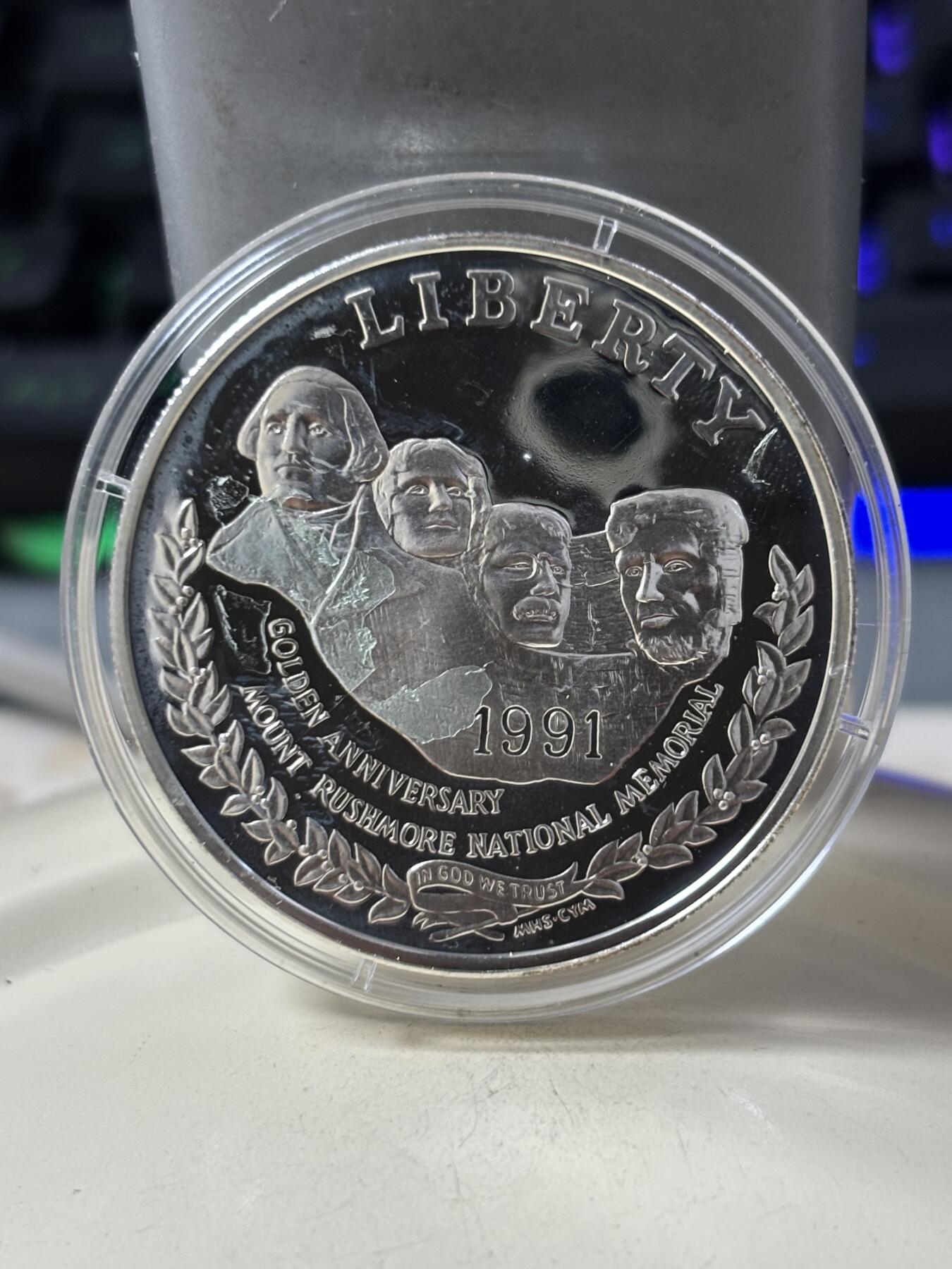 第185期拍卖 美国1991年总统山1美元纪念银币，900银，26.73克，银价360