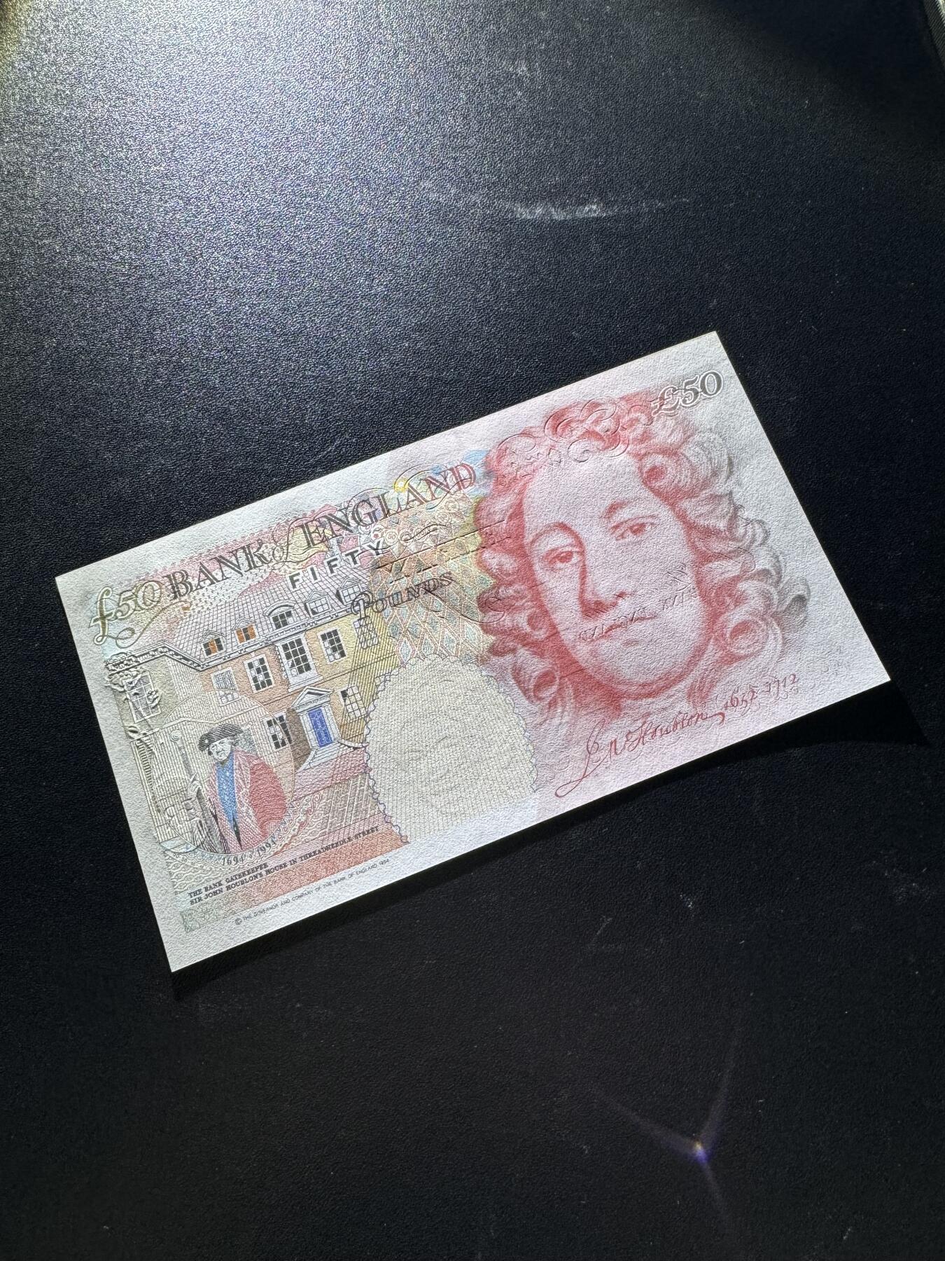 【外币出坑】0元0佣金起拍 无保留价 英国E序列 50磅 倒置号AU-Unc 如图