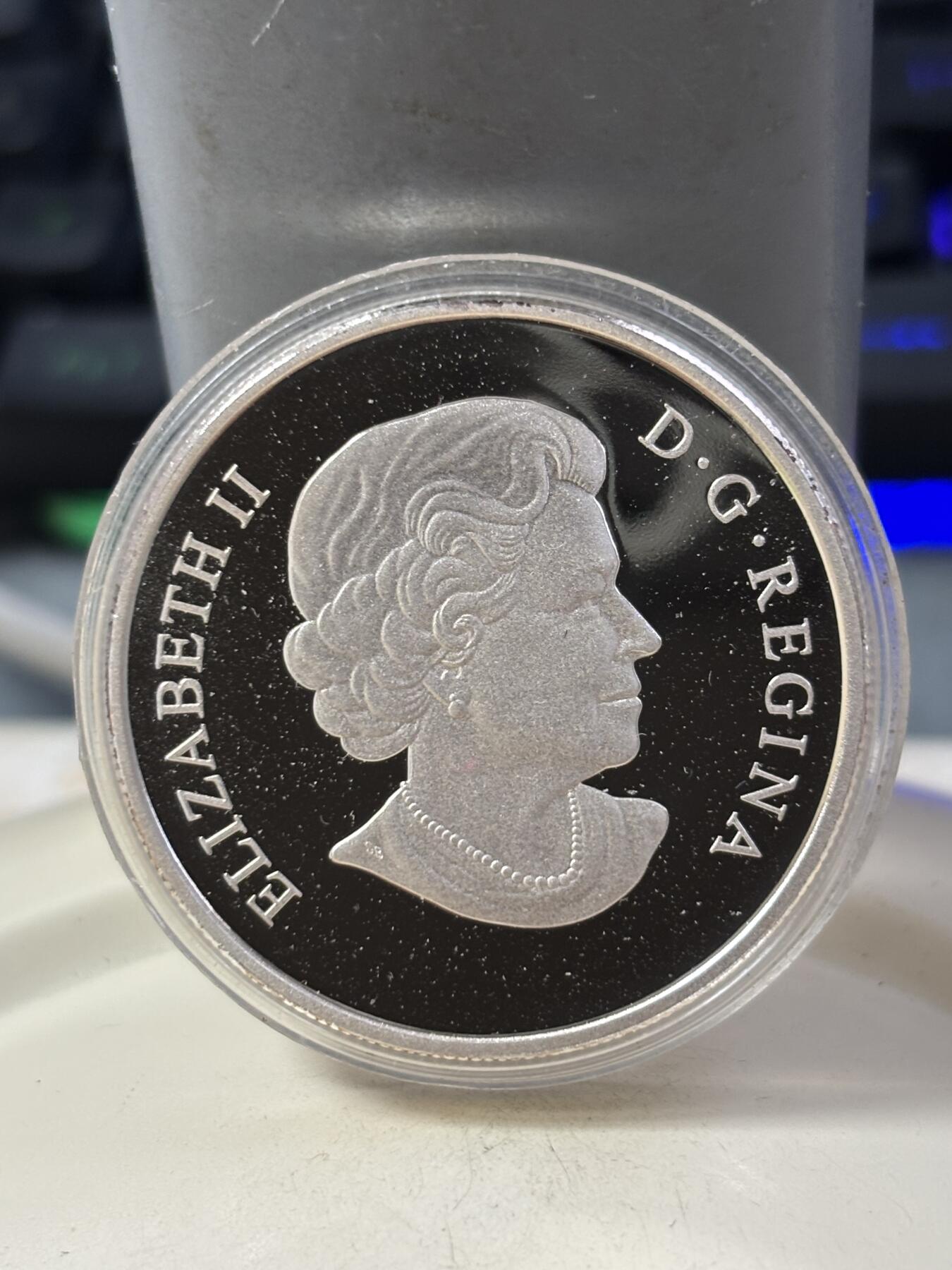 第185期拍卖 加拿大2014年生肖马年1盎司纪念银币，999银，塑料盒有裂痕，银价465元