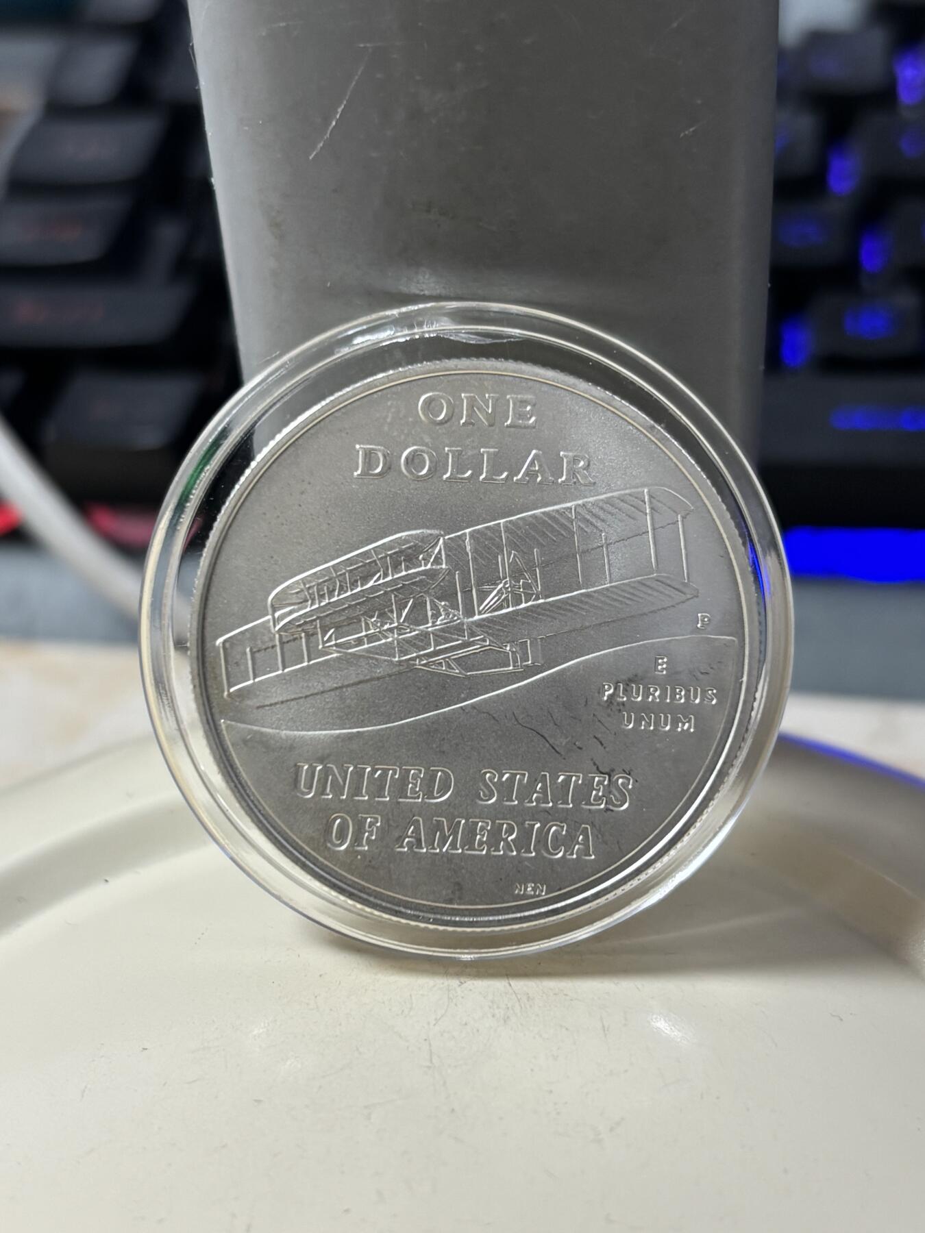 第185期拍卖 美国2003年人类首飞莱特兄弟磨砂版银币，900银，26.72克，银价360