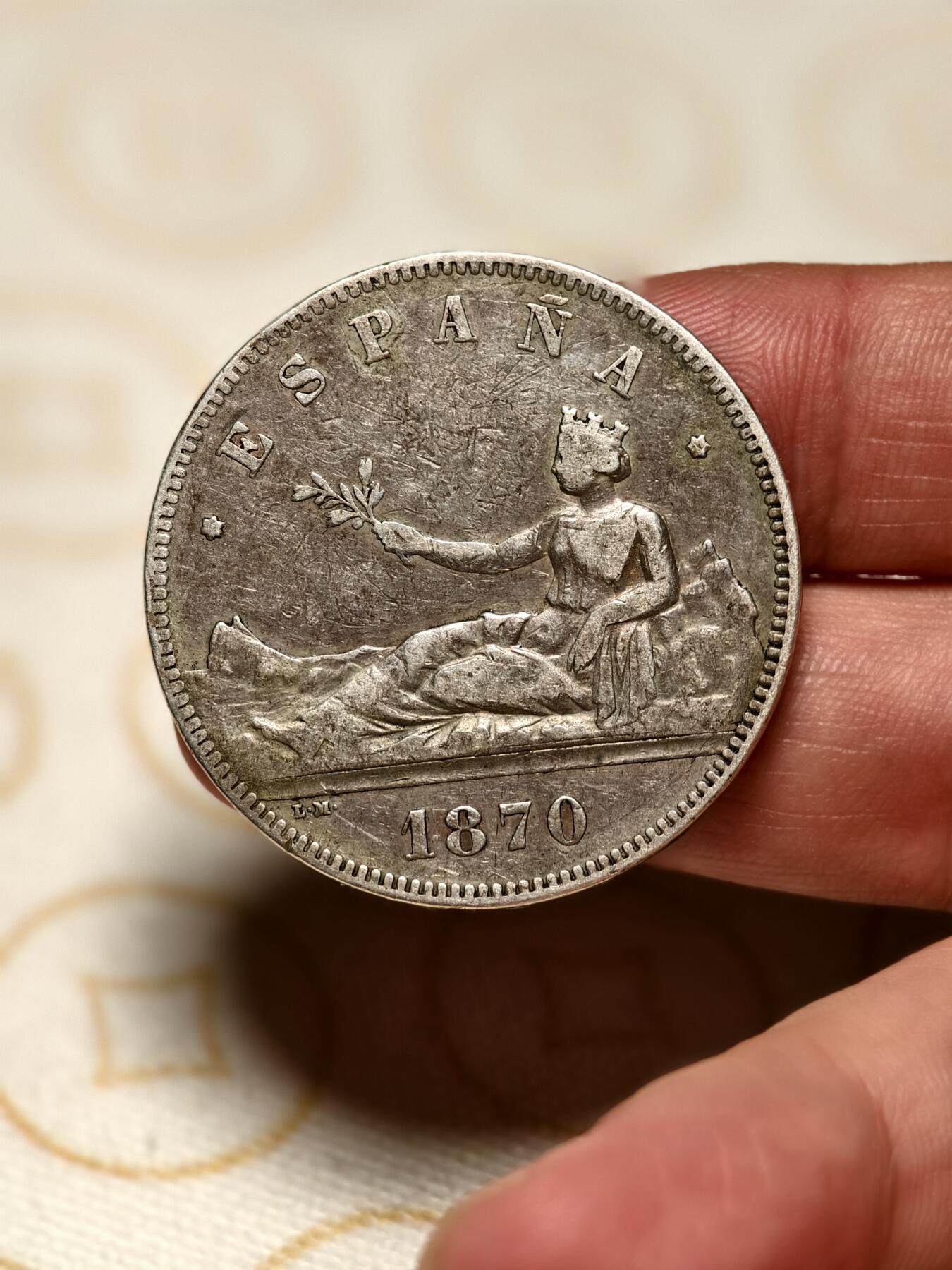 抚柳草堂-第三期章牌钱币 奖章勋章限时免佣 满百包邮 放漏专场 1870西班牙5比塞塔拿花双柱银币 临时政府时期 重24.7g 整体状态不错