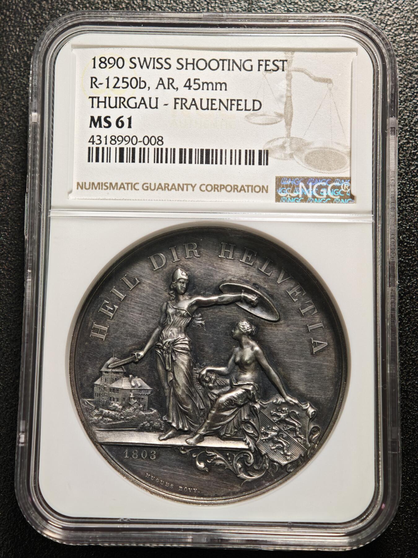 【德藏】世界币章拍卖第158期（拍品征集中~欢迎藏友联系） 1890年 瑞士劳恩菲尔德射击节高浮雕纪念大银章 NGC MS61 正面是两位女神，一位女神一手持剑一手高举盾牌，另一位女神坐着观看，姿态优雅；背面是射击节盾徽，盾徽中间是美女用绳索勒住狮子的脖子。双面高浮雕工艺，整体雕刻精美，人物动物细节丰富，保存状态很好，黑包浆醇厚，早期NGC低评