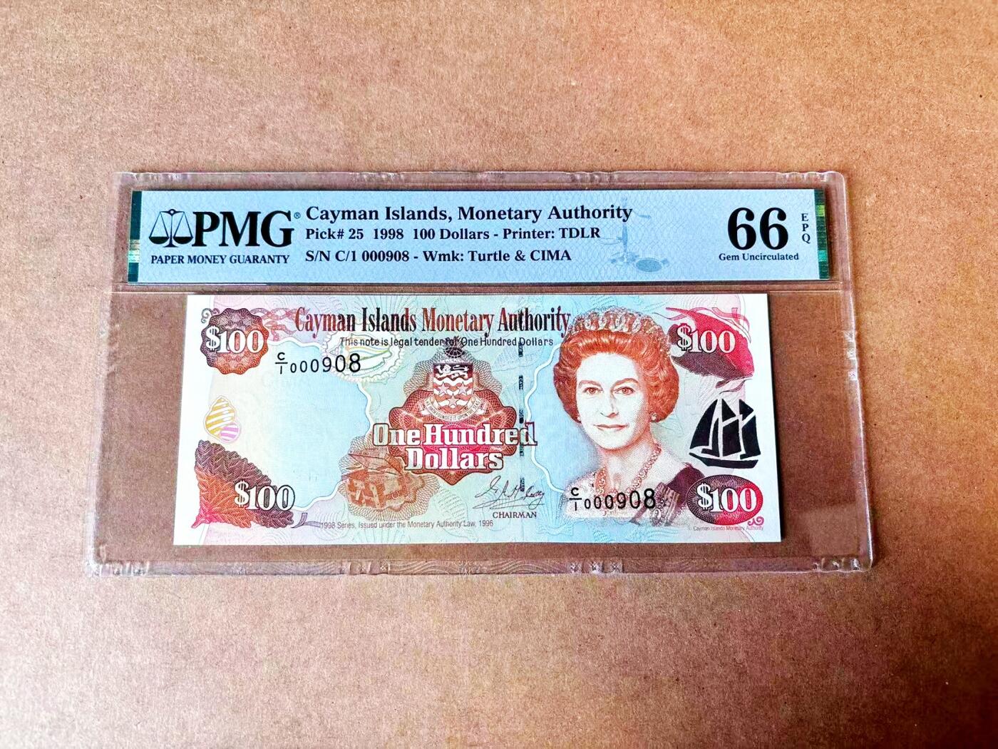 【Blue Auction】世界纸币精拍第765期——18级TOP拍卖/信誉/品质/专业/高效💫 【C/1首发冠 908倒置小号】开曼群岛 1998年100元 女王 PMG66EPQ 背后海岛大场景 