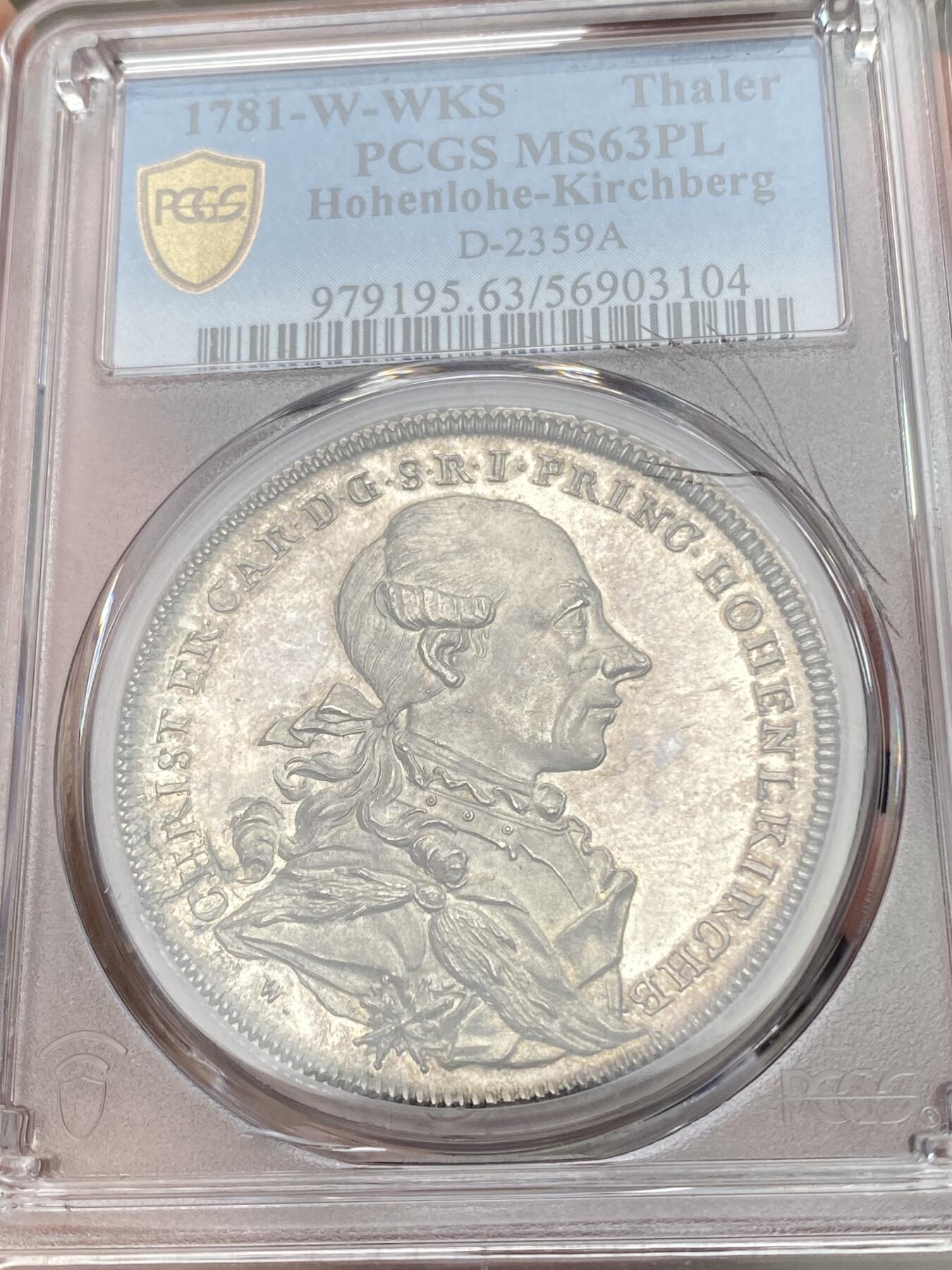 万国钱币拍卖第058期（万国新年大拍） PCGS MS63PL 1781年德国霍恩洛赫·基尔贝格里斯蒂安·弗里德里希·卡尔双狮护盾大泰勒 施瓦巴赫造币厂铸 来自18世纪末德国顶级铸币工艺 类精制镜面喷砂质感极强 高浮雕人像跃然于币面  高点细节令人惊叹 实物上手惊艳的一枚 绝对不可多得的顶级小邦泰勒藏品 PC唯一冠军分