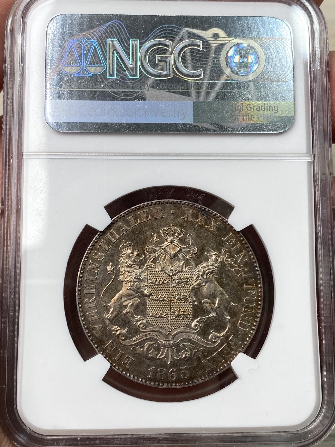 万国钱币拍卖第058期（万国新年大拍） NGC UNCD 1865年德国符腾堡狮鹿护盾流通泰勒 联合泰勒难点之一 双面玫瑰红彩高点上乘