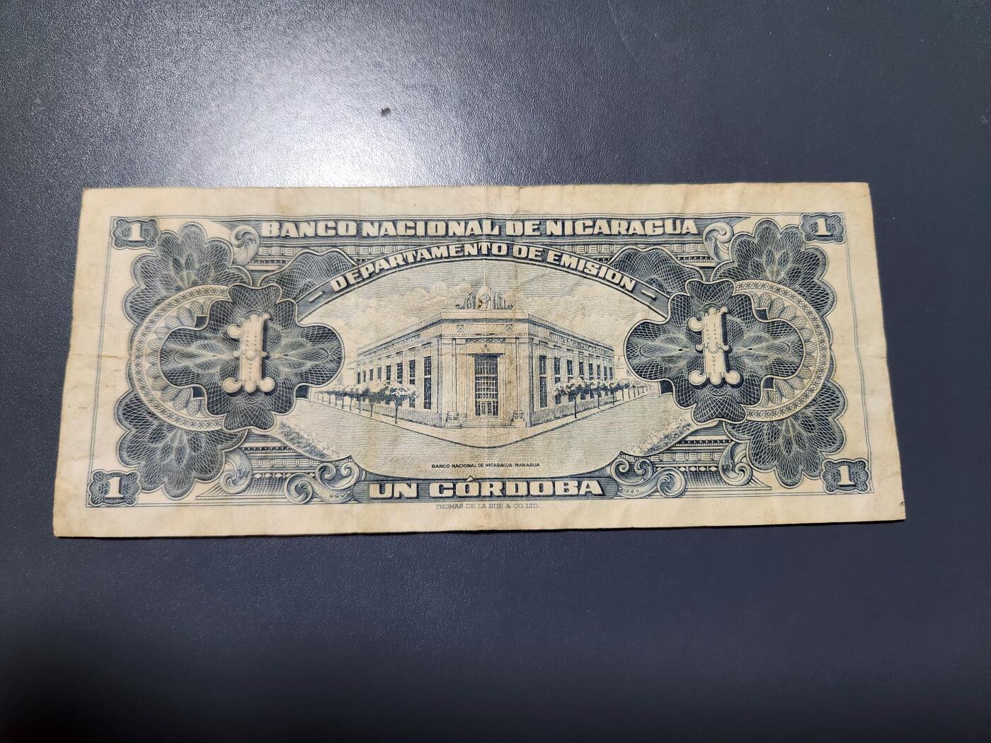 12月21号晚上8点 外国纸币自动截拍第75场 尼加拉瓜 1958年 1科多巴 美品