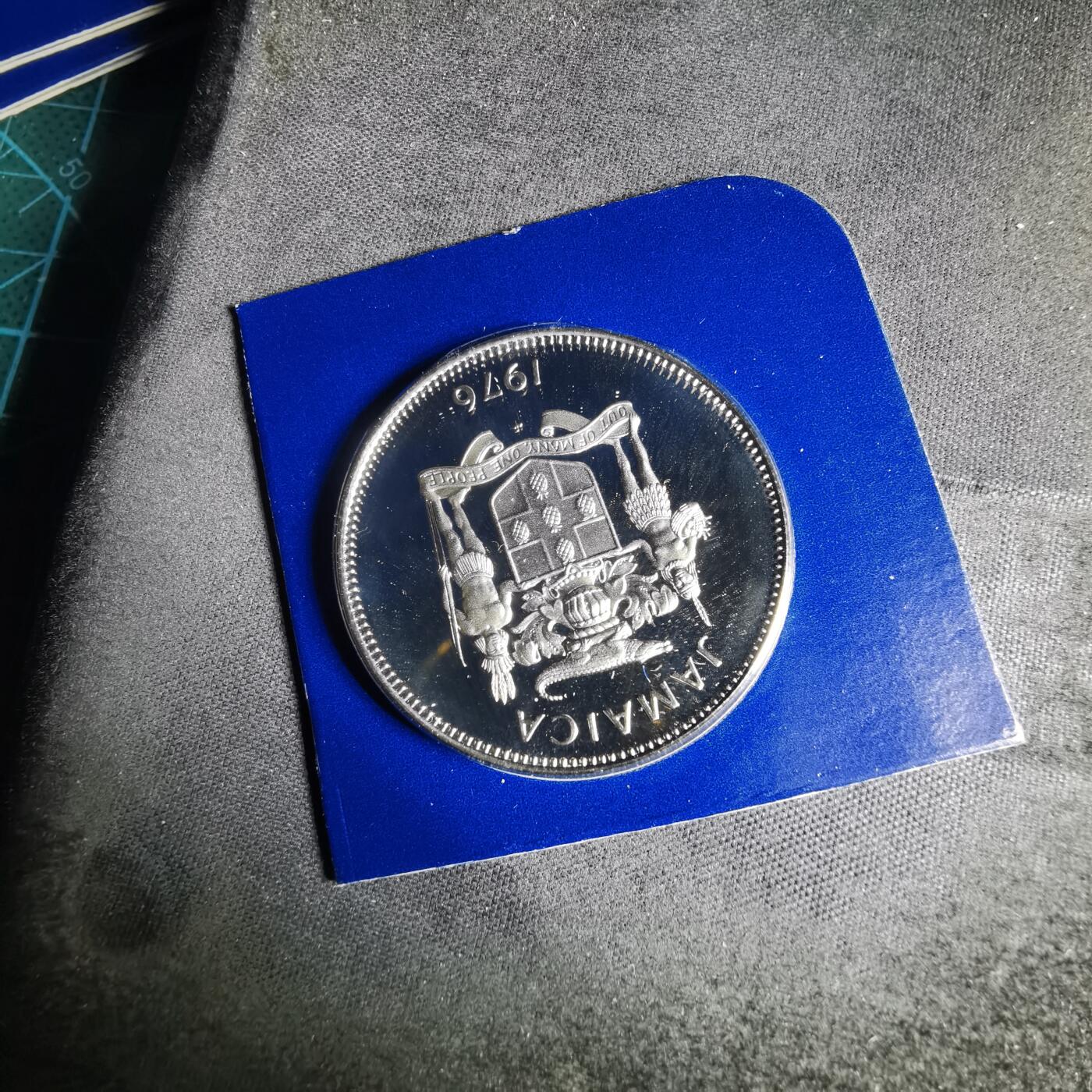 沼泽如烟--第941场 牙买加1976年25分精制币