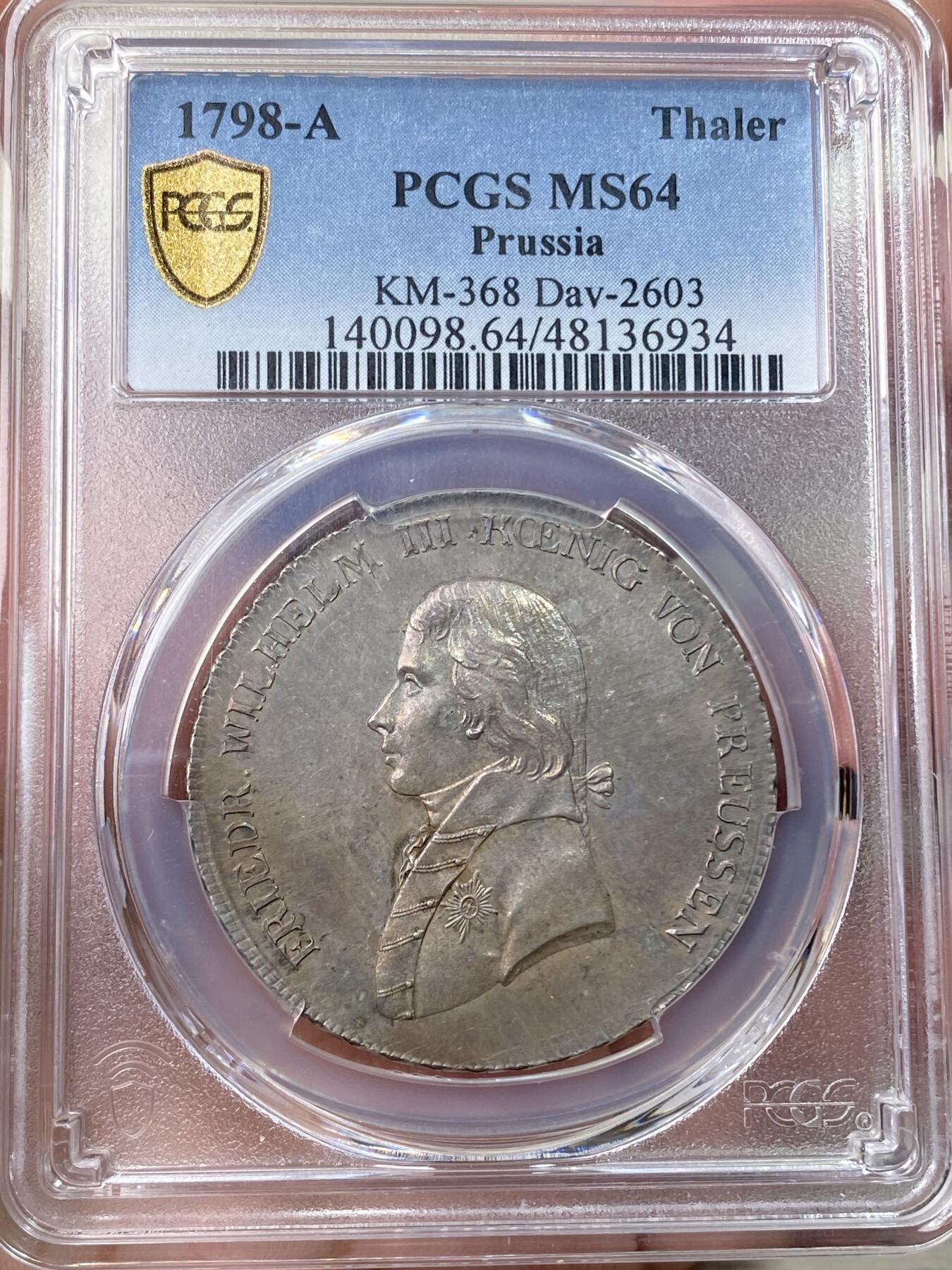 万国钱币拍卖第058期（万国新年大拍） PCGS MS64 1798年德国普鲁士威廉三世野人护盾流通大泰勒 普鲁士名品之一 均匀德式五彩 打制周正  威三胸前勋章以及野人重点部位的高点极其出色 一步到位的典藏级品质 PCGS冠军分