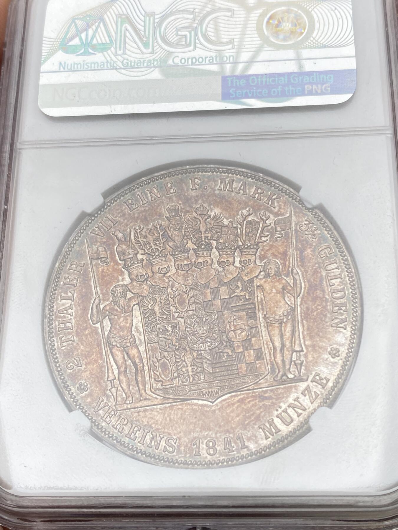 万国钱币拍卖第058期（万国新年大拍） NGC AU58 1841年德国施瓦茨堡-桑德斯豪森野人流通2泰勒 邦国时期2泰勒代表之作 独特的纹章设计令人过目难忘 因发行量稀少想入藏一枚好品难度极大 双面原味火烧云晚霞包浆 高点细节极佳