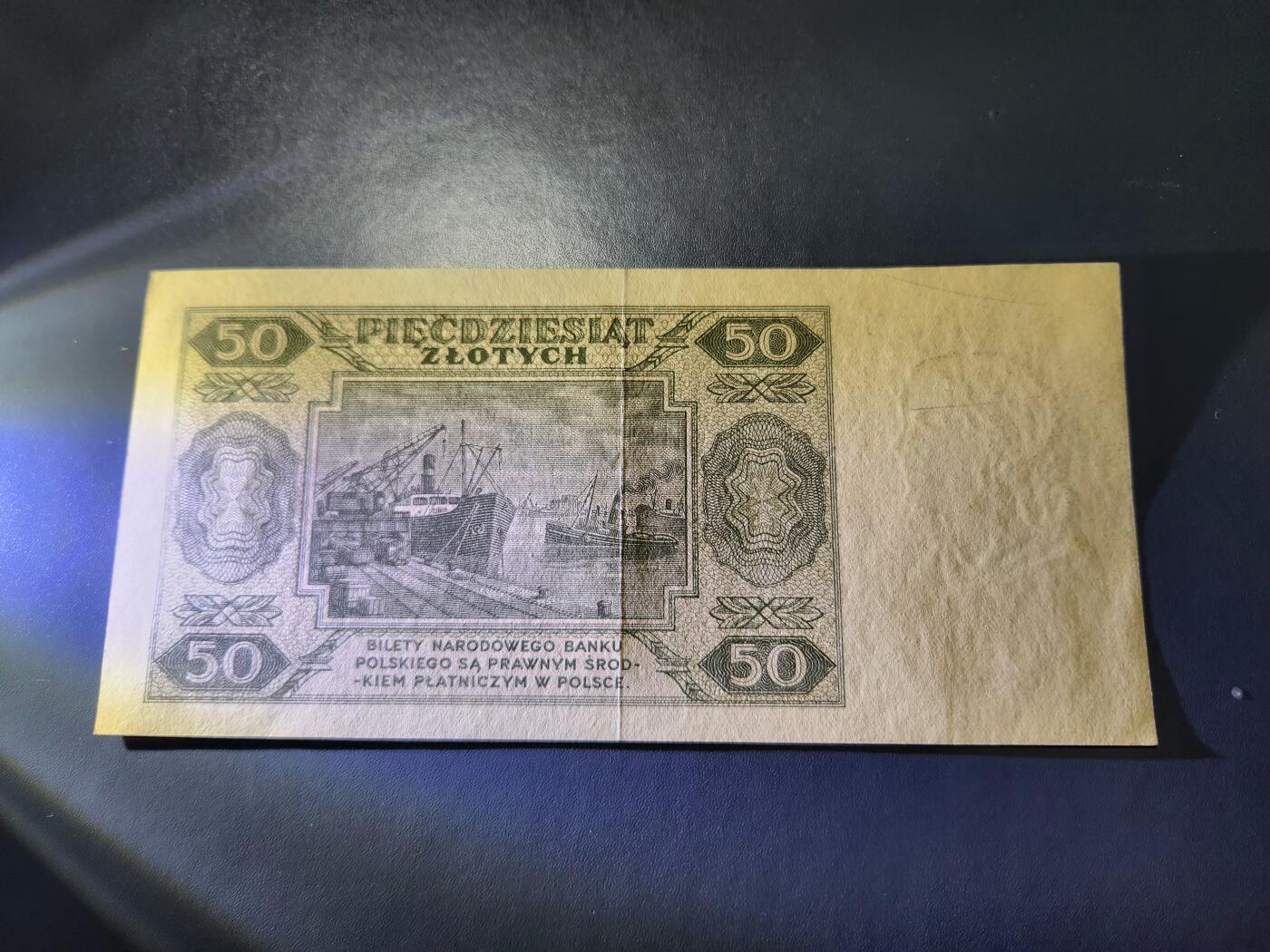 12月20号晚上8点 外国纸币自动截拍第74场 波兰 1948年50兹罗提 柱体号码 尾号188 极美品有折