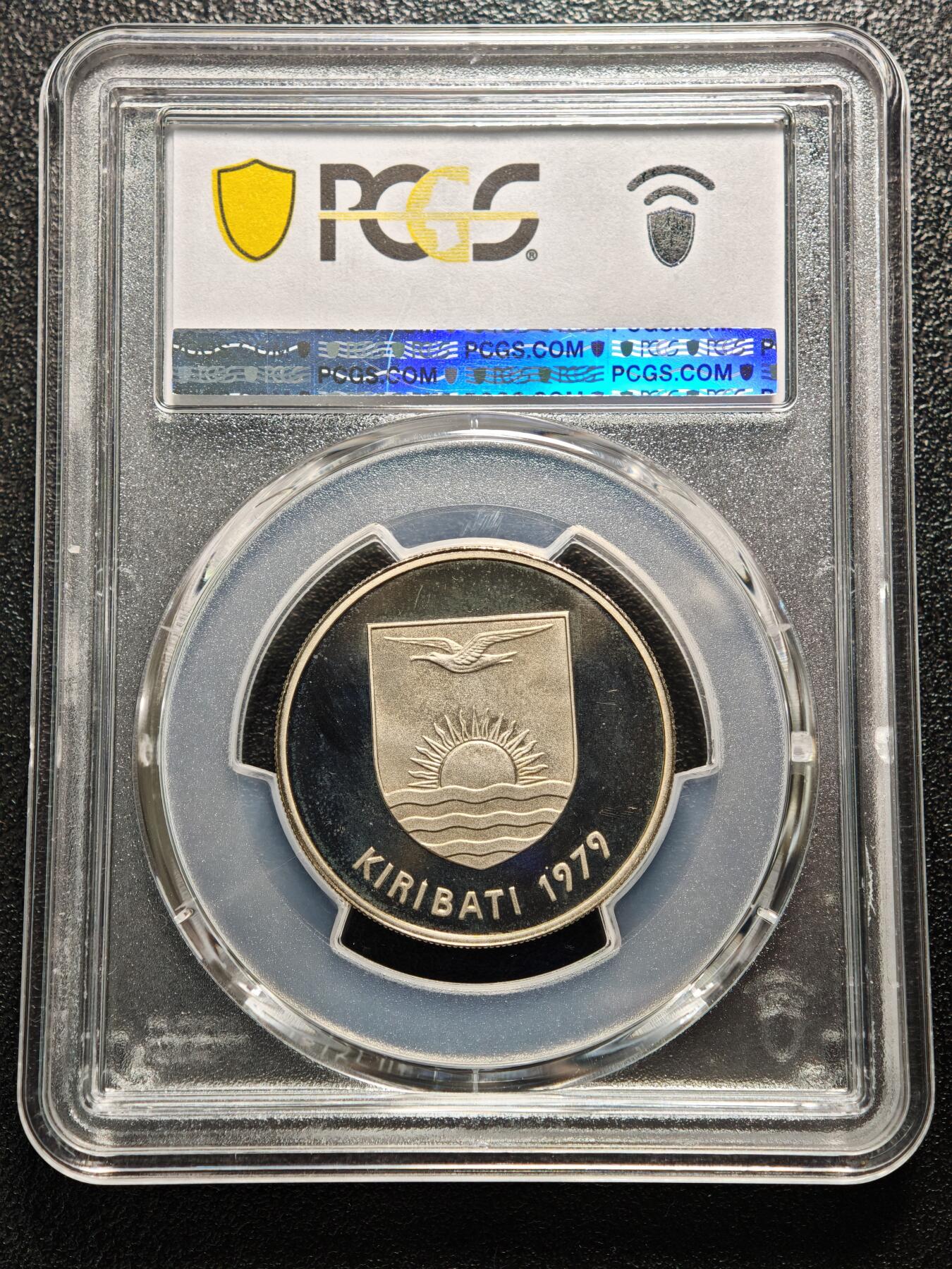 【德藏】世界币章拍卖第158期（拍品征集中~欢迎藏友联系） 1979年 基里巴斯海豚20分精制纪念镍币 这枚是基里巴斯脱离英国殖民统治后发行的首批流通纪念币之一 PCGS PR68DCAM