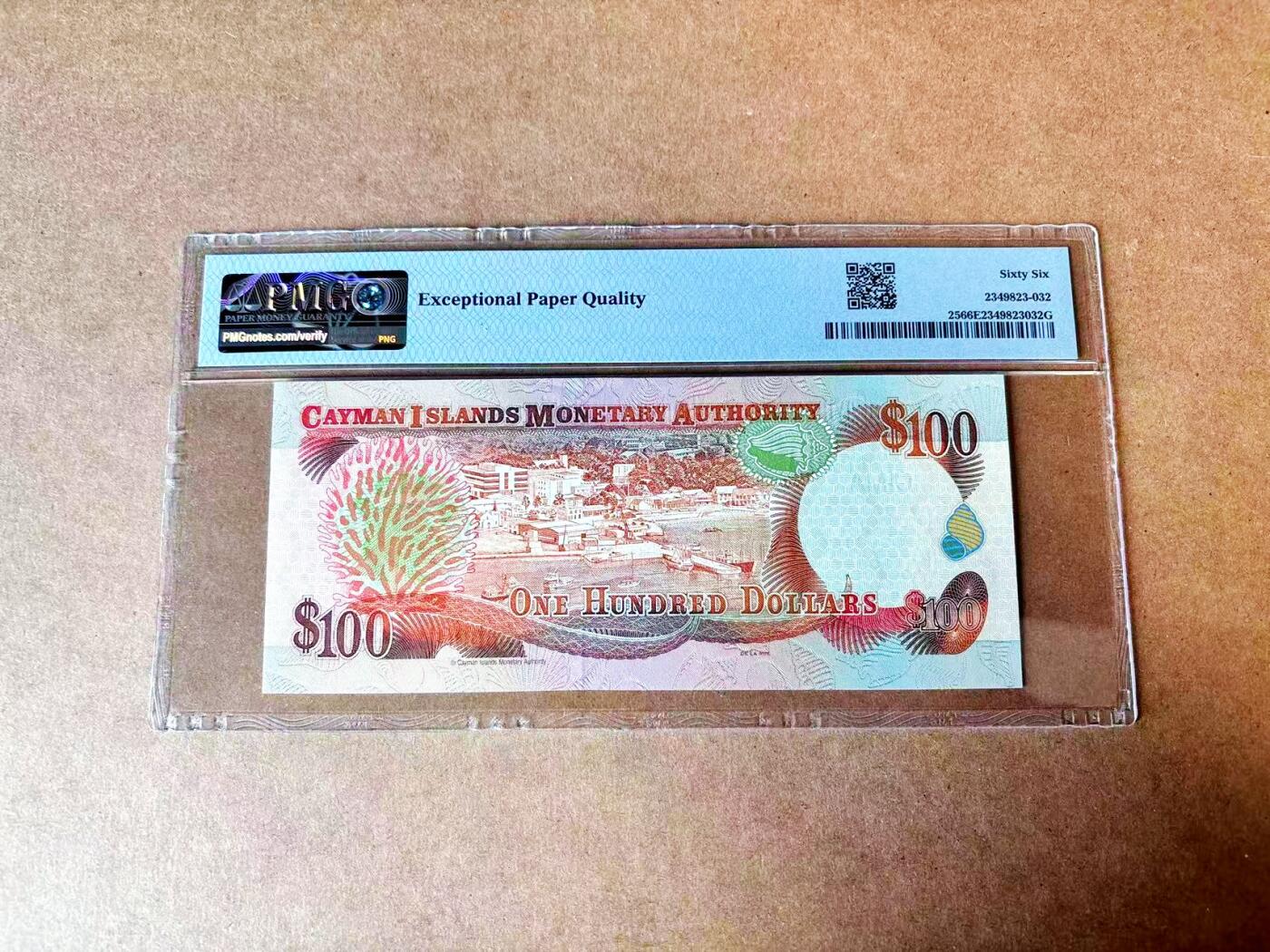 【Blue Auction】世界纸币精拍第765期——18级TOP拍卖/信誉/品质/专业/高效💫 【C/1首发冠 908倒置小号】开曼群岛 1998年100元 女王 PMG66EPQ 背后海岛大场景 