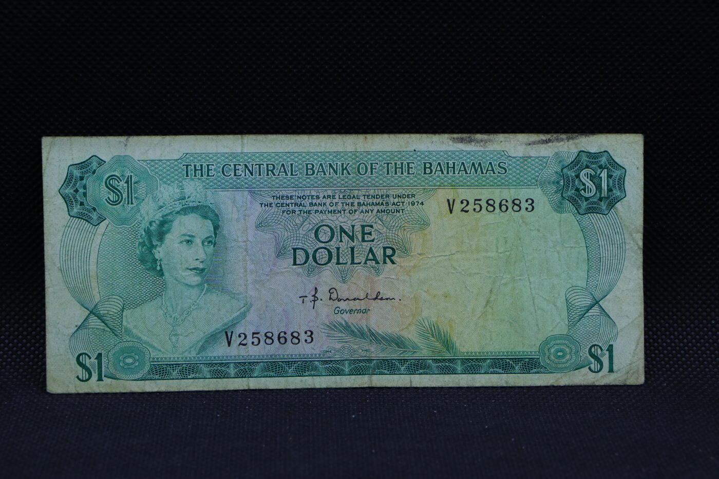 【淘币小摊】限时拍第八百三十四拍  纸币场  满百包邮可预留两周  周一统一发货   巴哈马1974年1元纸币【有折】