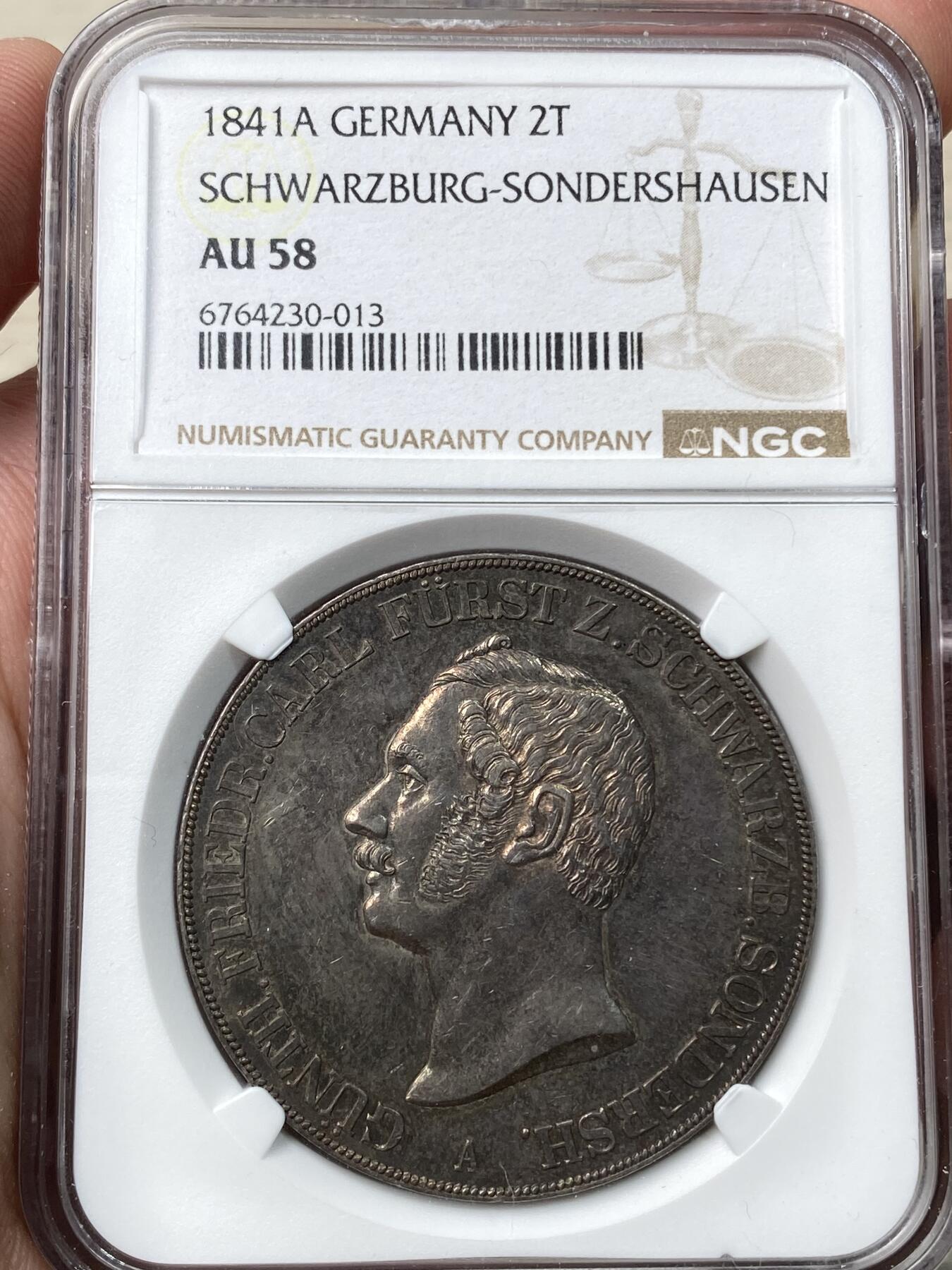 万国钱币拍卖第058期（万国新年大拍） NGC AU58 1841年德国施瓦茨堡-桑德斯豪森野人流通2泰勒 邦国时期2泰勒代表之作 独特的纹章设计令人过目难忘 因发行量稀少想入藏一枚好品难度极大 双面原味火烧云晚霞包浆 高点细节极佳
