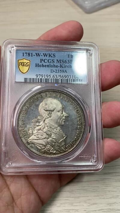 万国钱币拍卖第058期（万国新年大拍） PCGS MS63PL 1781年德国霍恩洛赫·基尔贝格里斯蒂安·弗里德里希·卡尔双狮护盾大泰勒 施瓦巴赫造币厂铸 来自18世纪末德国顶级铸币工艺 类精制镜面喷砂质感极强 高浮雕人像跃然于币面  高点细节令人惊叹 实物上手惊艳的一枚 绝对不可多得的顶级小邦泰勒藏品 PC唯一冠军分