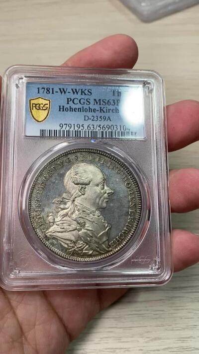万国钱币拍卖第058期（万国新年大拍） PCGS MS63PL 1781年德国霍恩洛赫·基尔贝格里斯蒂安·弗里德里希·卡尔双狮护盾大泰勒 施瓦巴赫造币厂铸 来自18世纪末德国顶级铸币工艺 类精制镜面喷砂质感极强 高浮雕人像跃然于币面  高点细节令人惊叹 实物上手惊艳的一枚 绝对不可多得的顶级小邦泰勒藏品 PC唯一冠军分